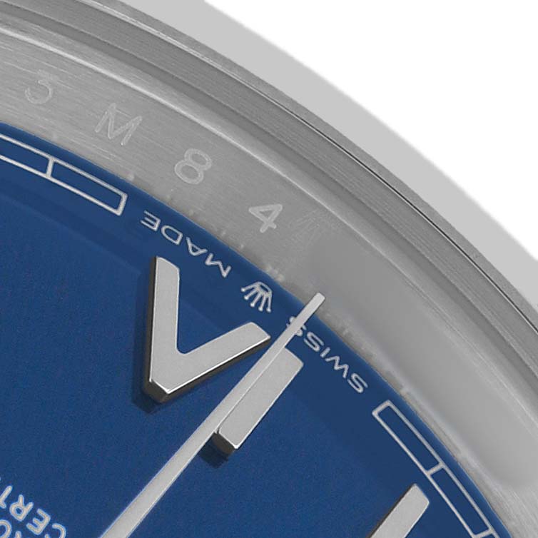 The image shows a close-up of the Rolex Datejust 41 126300 Men's Stainless Steel Blue Dial dial, focusing on the hour marker, minute hand, and edge markings.