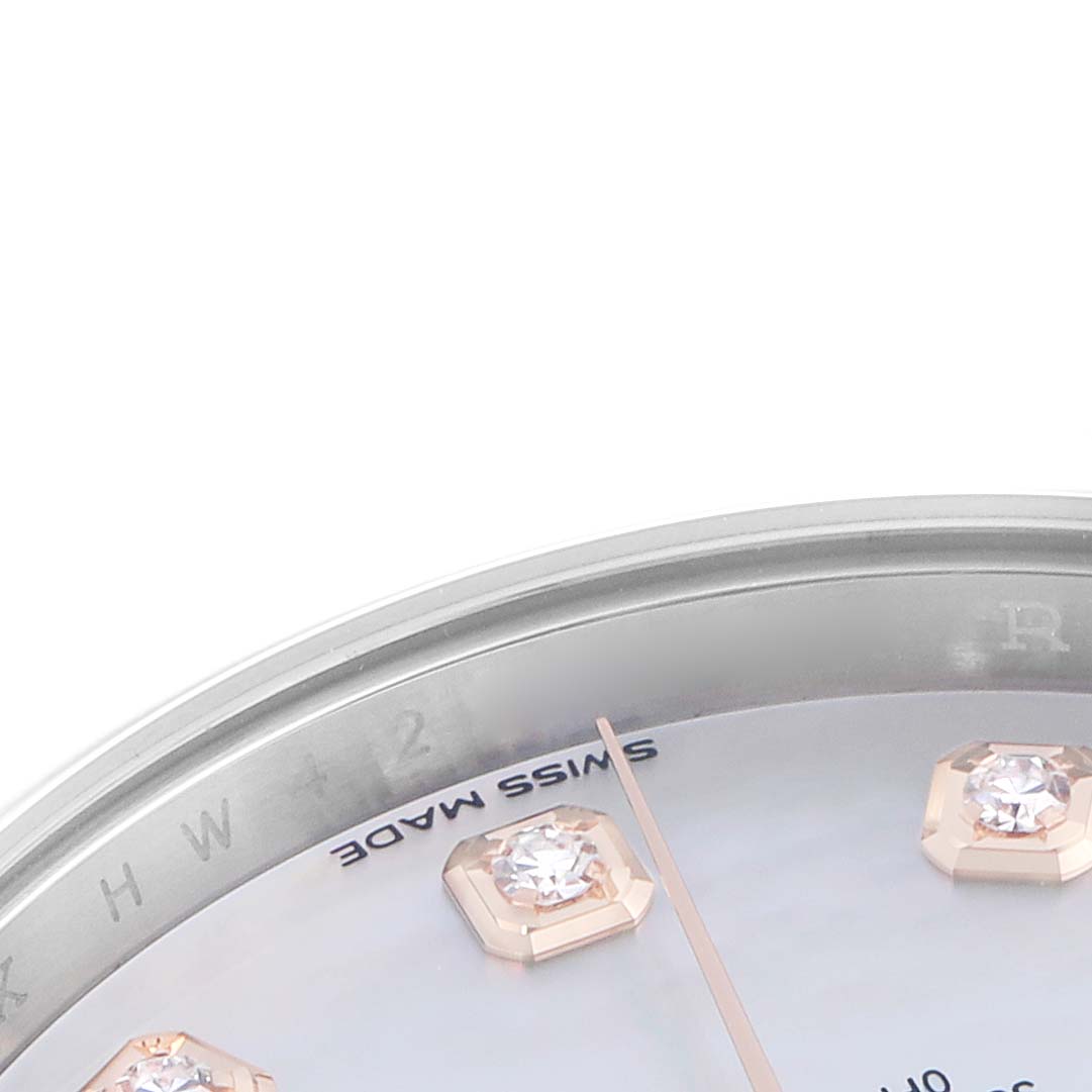 The image shows a close-up angle of the Rolex Datejust 41 126301 Men
s Steel and Gold (two tone) Mother of Pearl Dial watch
s dial, featuring diamond hour markers and part of the bezel.
