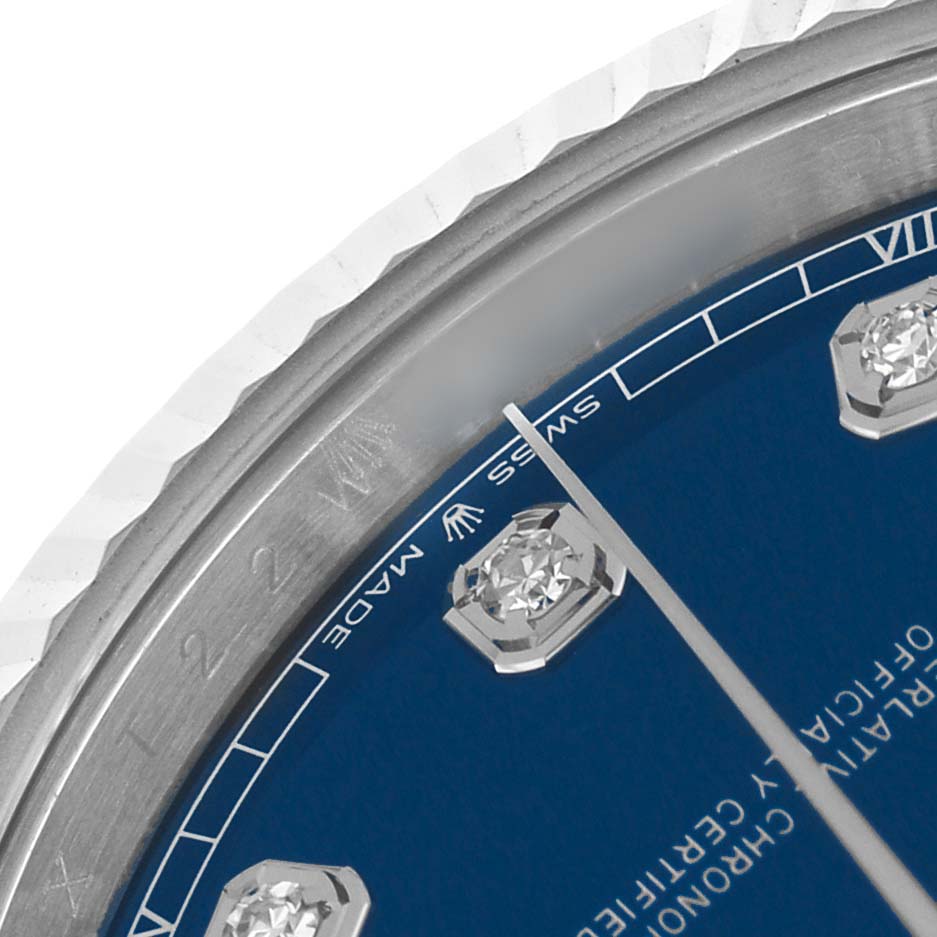The image shows a close-up of the Rolex Datejust 41 126334 Men's Stainless Steel Blue Dial model's dial and bezel with diamond markers and the "Swiss Made" text.