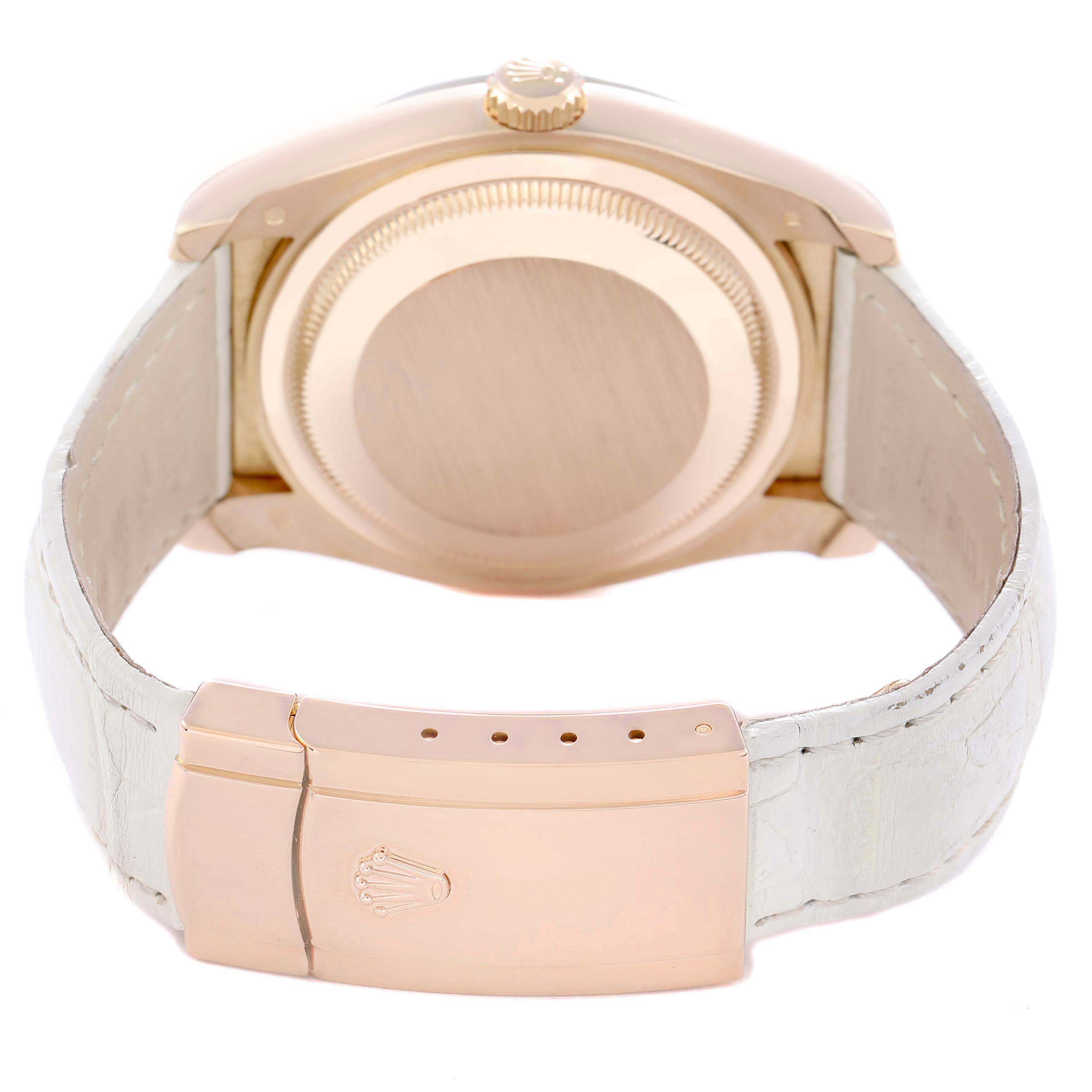 The image shows the back view of a Rolex Datejust 116185 Men's Rose Gold Mother of Pearl Dial, highlighting the clasp and case back with a leather strap.