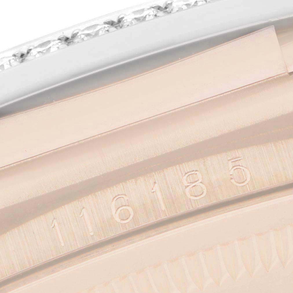 The image shows a close-up of the Rolex Datejust 116185 Men's Rose Gold Mother of Pearl Dial model's case edge and engraved serial or reference number.