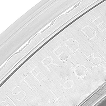 This close-up image shows the engraved details on the case back of the Rolex Vintage Collection 1603 Men
s Stainless Steel Silver Dial 1603 Men
s Stainless Steel Silver Dial model.