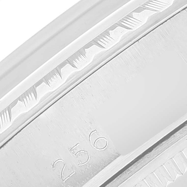 This is a close-up angle showing the engraved serial number on the case of the Vintage Collection model by Rolex.