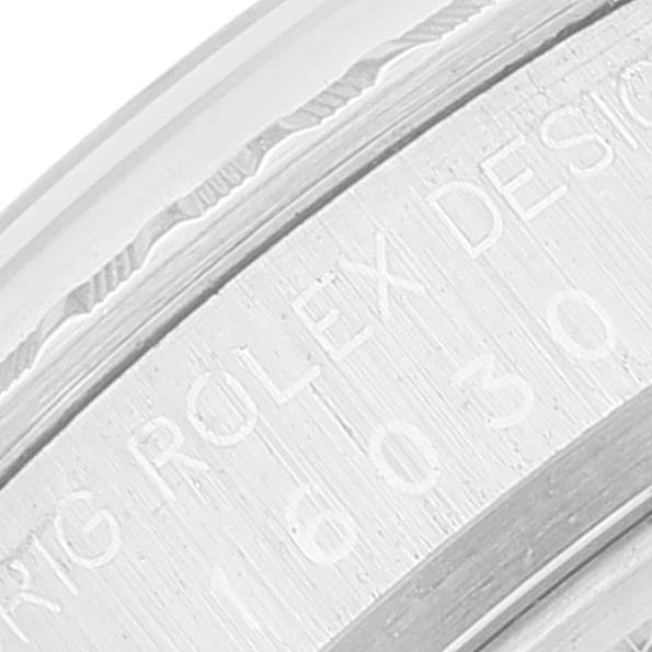 The image shows a close-up of the engraved side of the Rolex Vintage Collection 16030 Men
s Stainless Steel Silver Dial 16030 Men
s Stainless Steel Silver Dial watch case with partial serial and model numbers.