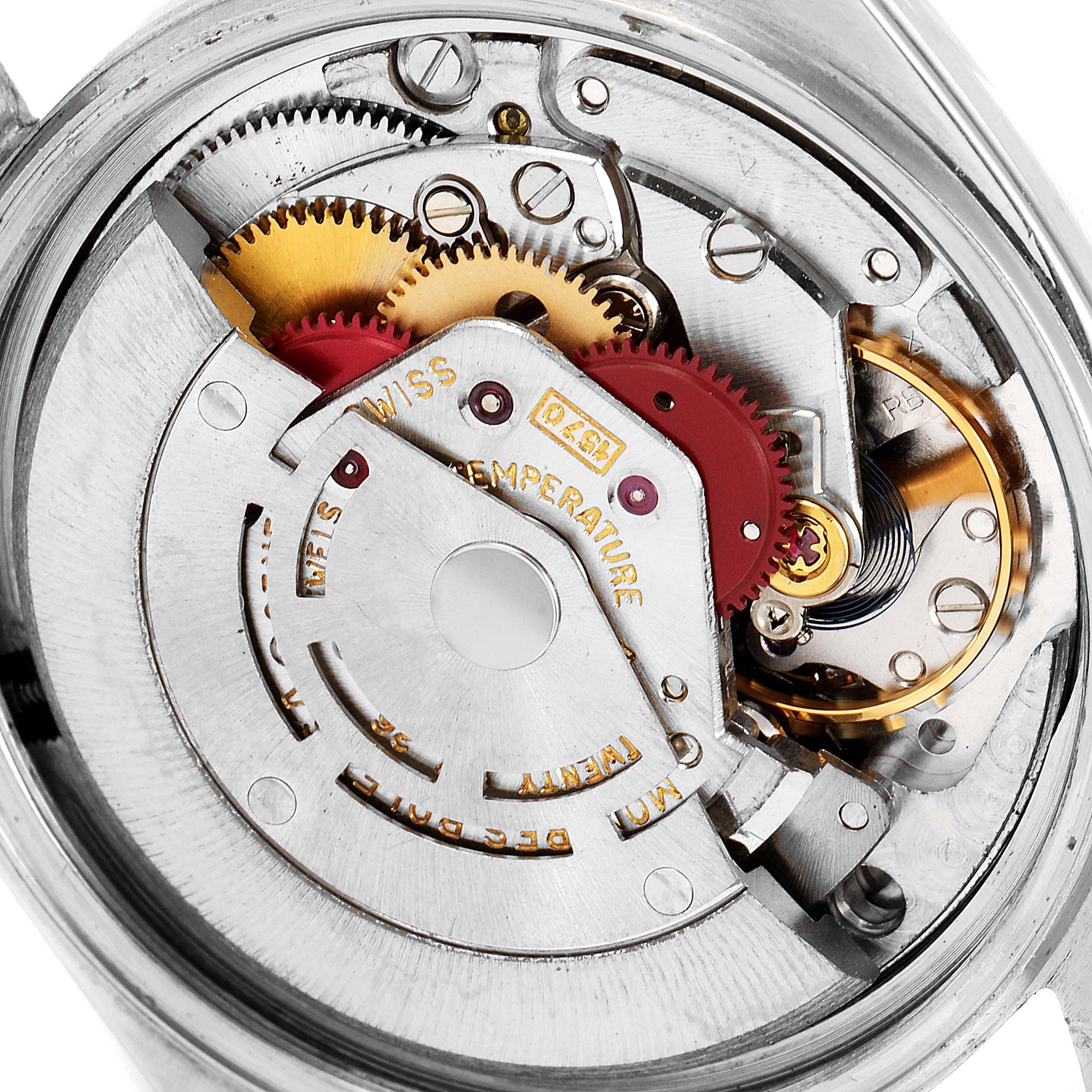 The image shows the internal mechanism and gears of a Rolex Vintage Collection 1601 Men's Steel and Gold (two tone) Black Dial 1601 Men's Steel and Gold (two tone) Black Dial model watch from a close-up angle.