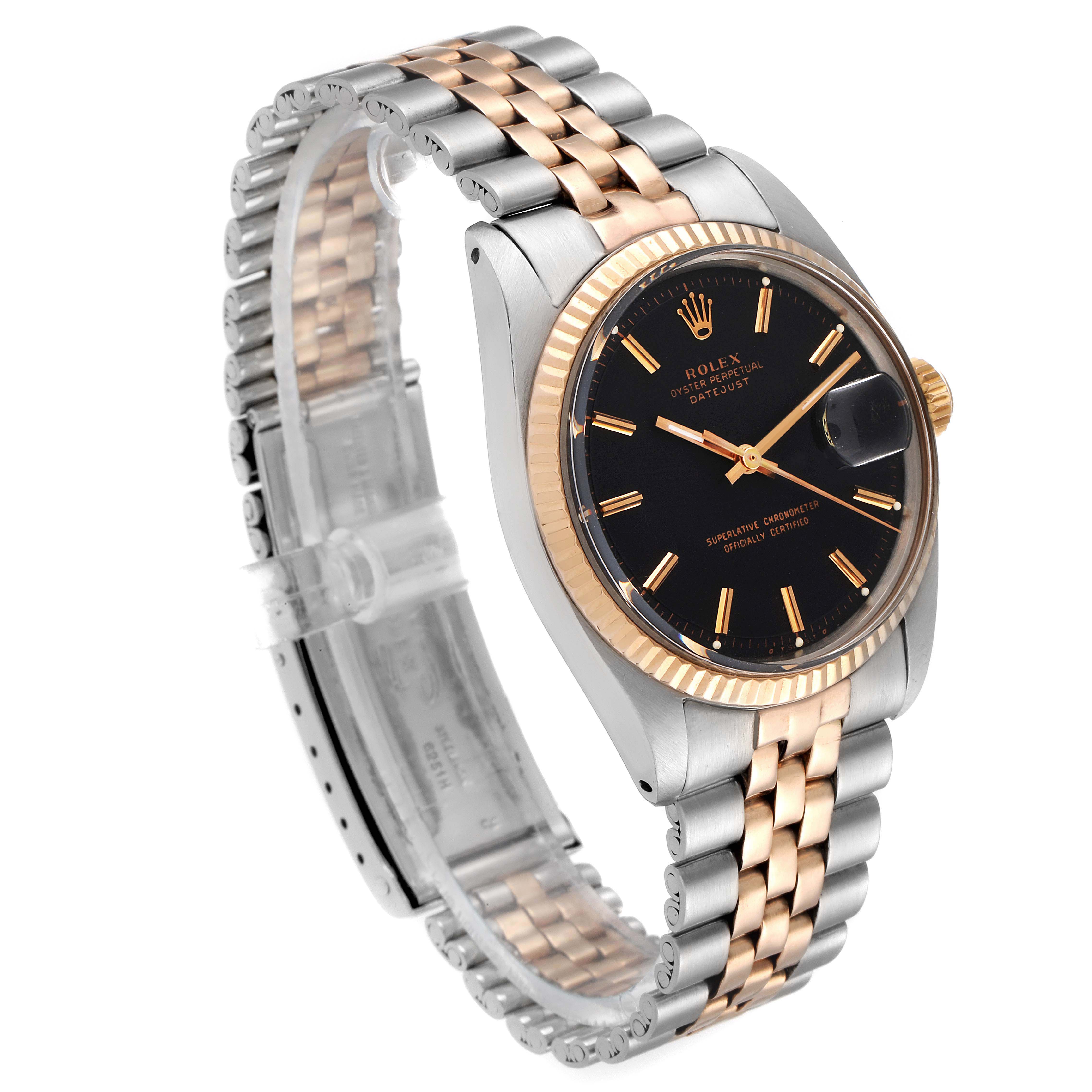 The Vintage Collection Rolex watch is shown from a three-quarter angle, highlighting the face, bezel, and two-tone metal bracelet.