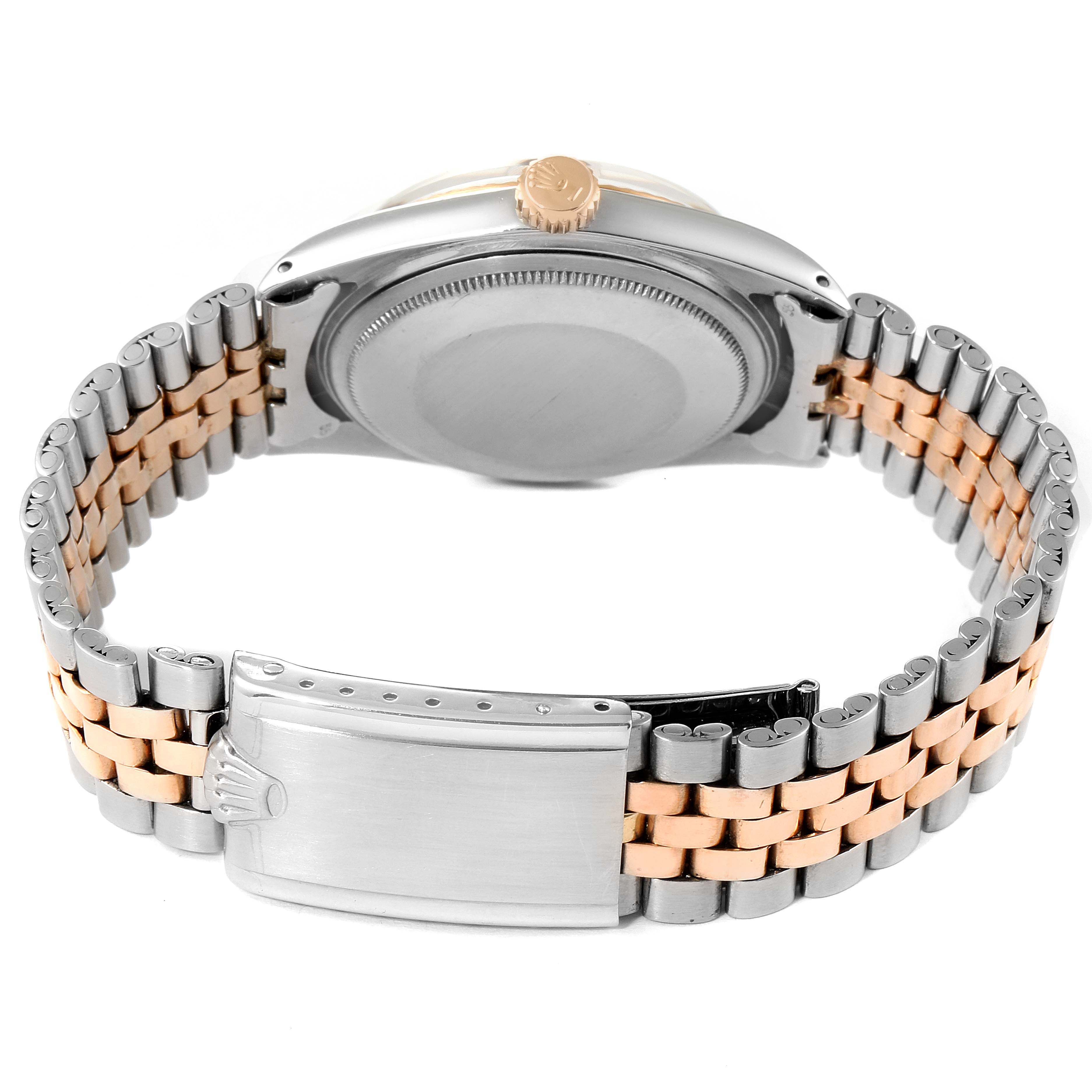 The image shows the backside of a Rolex Vintage Collection 1601 Men's Steel and Gold (two tone) Black Dial 1601 Men's Steel and Gold (two tone) Black Dial watch, highlighting the clasp and two-tone bracelet.