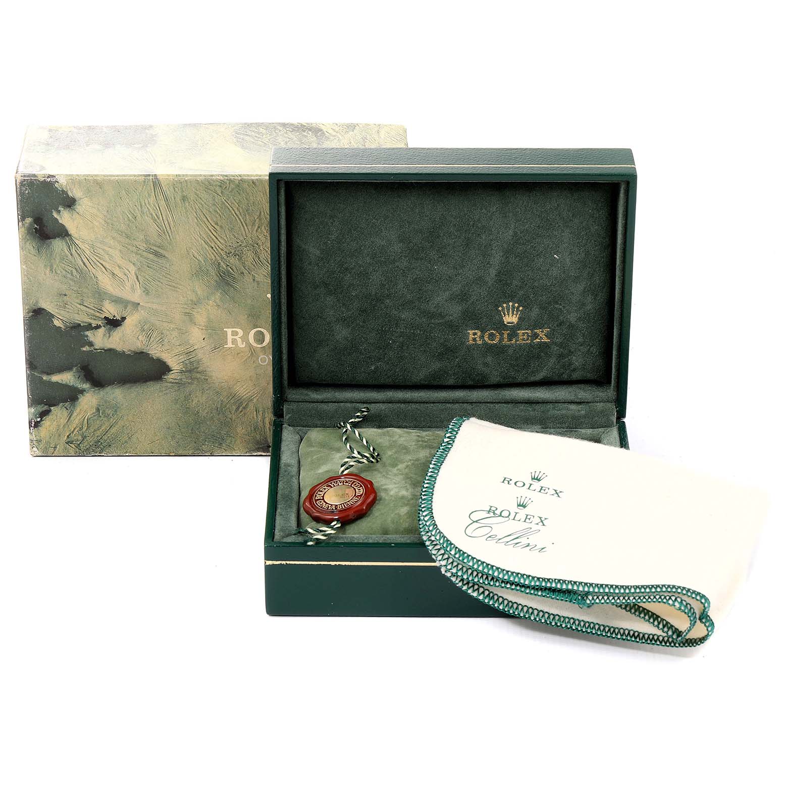 The image shows packaging including a box, a tag, and a cloth for the Vintage Collection model by Rolex.