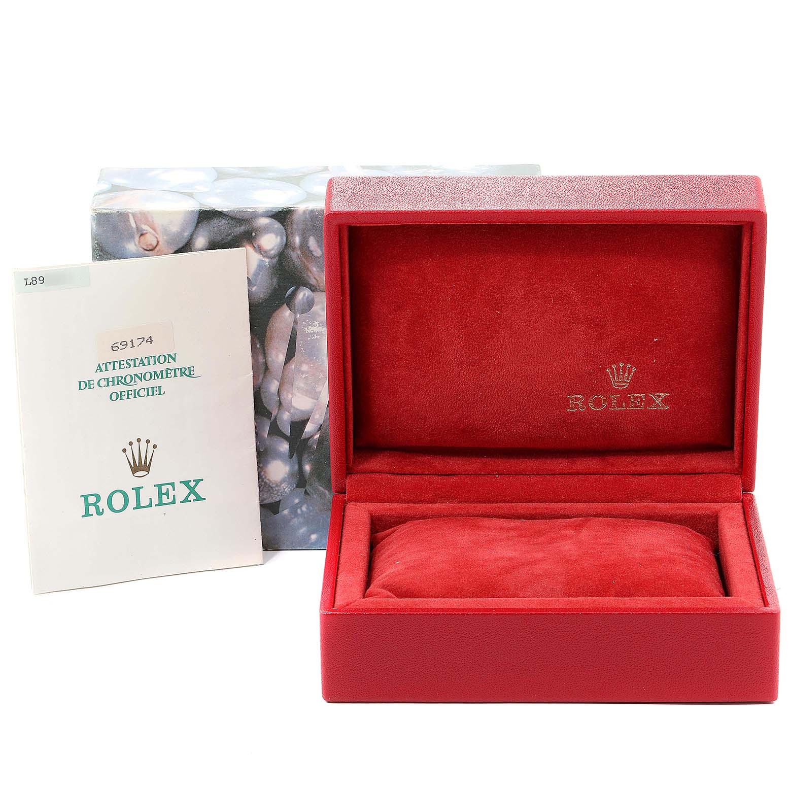 The image shows an open Rolex Datejust 69174 Women's Stainless Steel Silver Dial 69174 Women's Stainless Steel Silver Dial watch box with papers and the outer decorative box in the background.