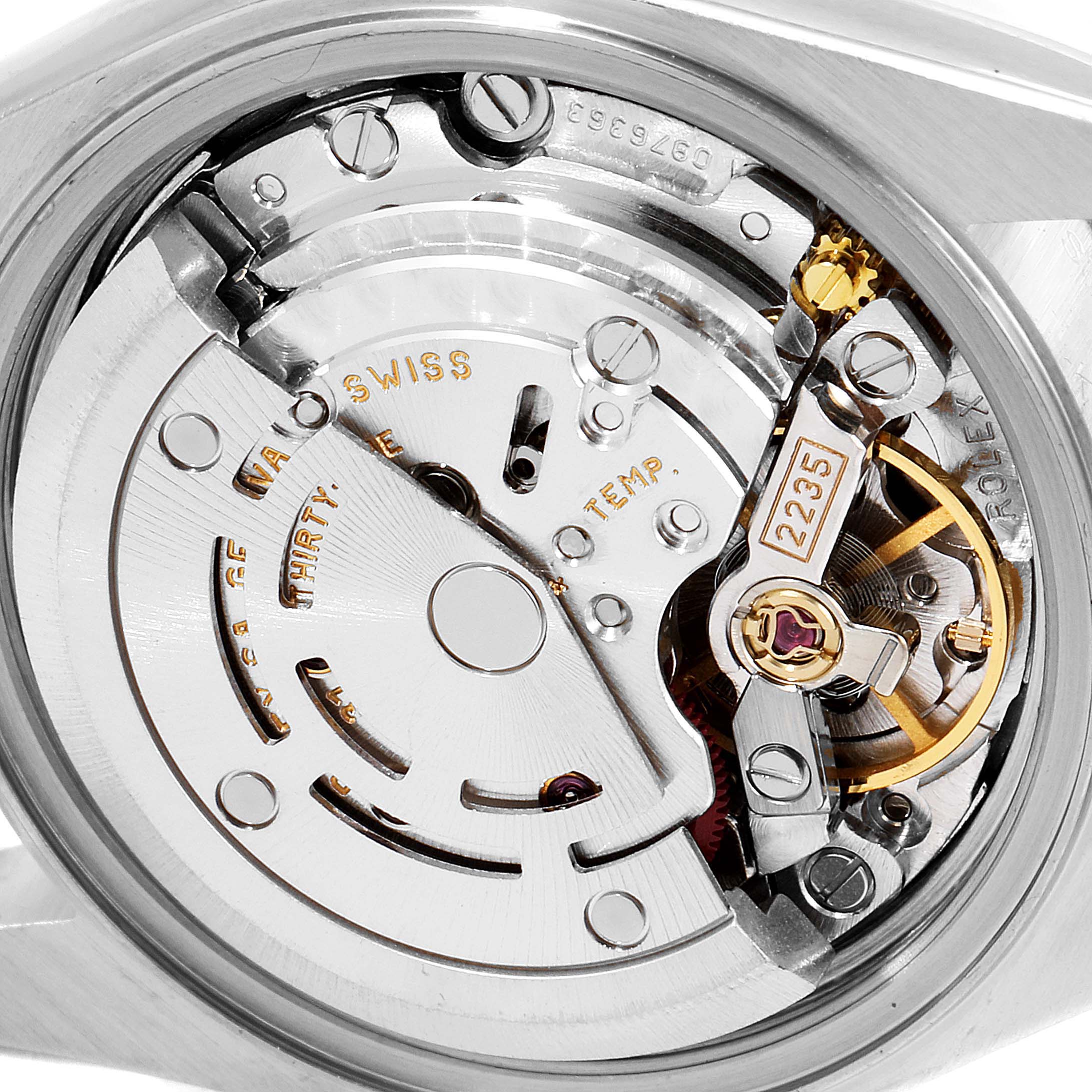 The image shows an inner view of the Rolex Datejust 79174 Women
s Stainless Steel Silver Dial 79174 Women
s Stainless Steel Silver Dial watch
s mechanical movement and components.