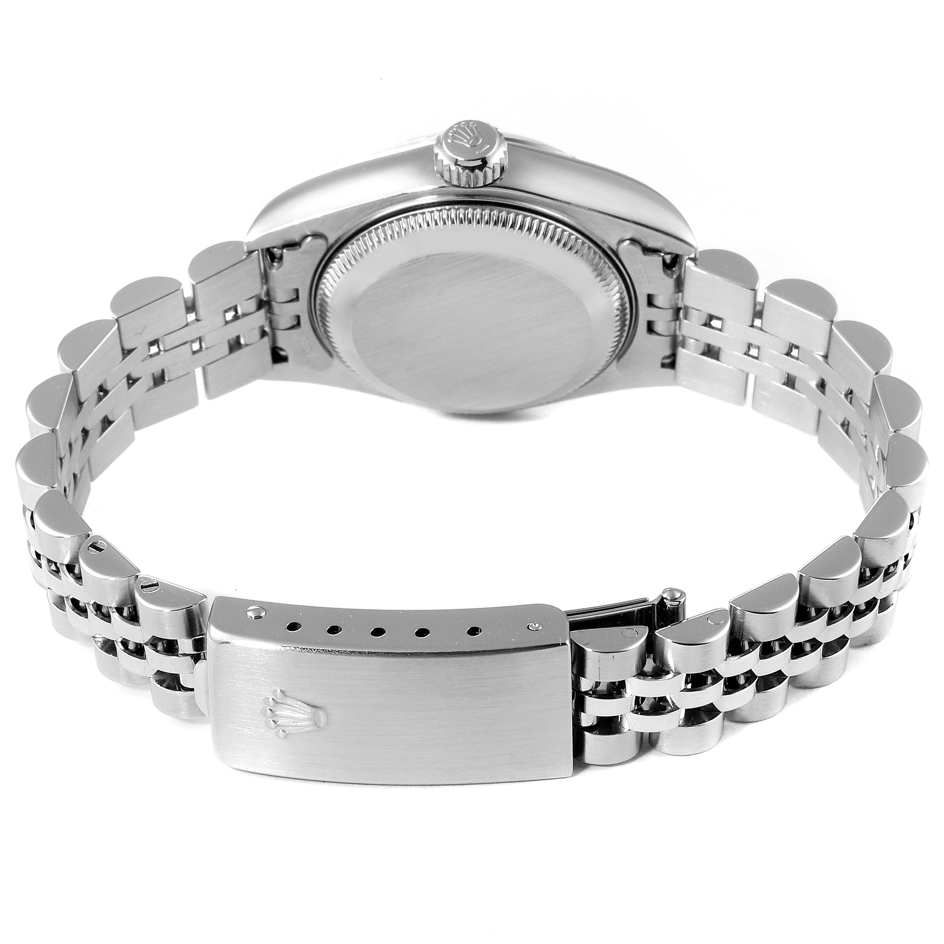 This image shows the backside and clasp of a Rolex Datejust 79174 Women
s Stainless Steel Silver Dial 79174 Women
s Stainless Steel Silver Dial watch, including the bracelet and case back parts.