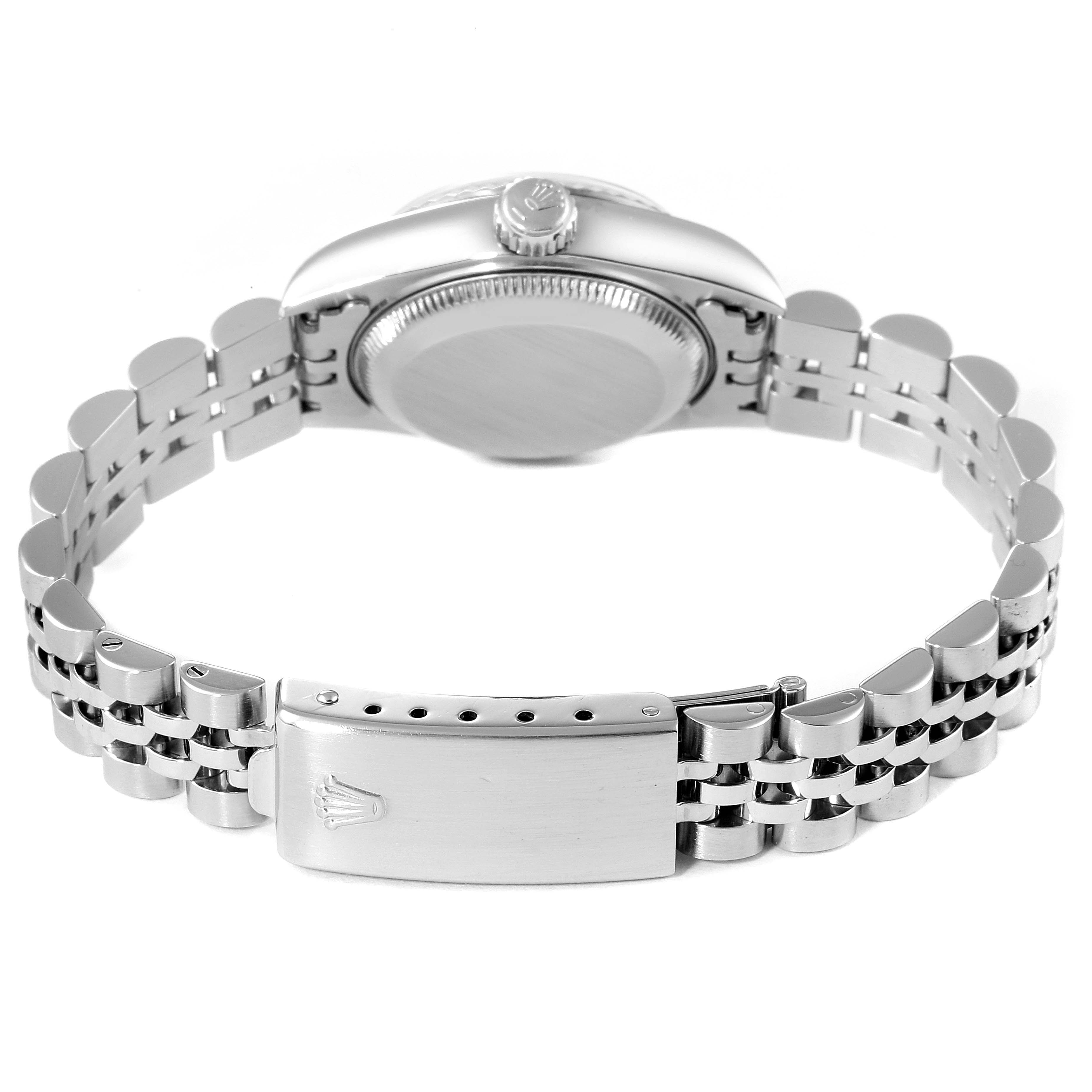 The image shows the back view of a Rolex Datejust 69174 Women
s Stainless Steel Silver Dial 69174 Women
s Stainless Steel Silver Dial watch, focusing on the case back, crown, and bracelet clasp.