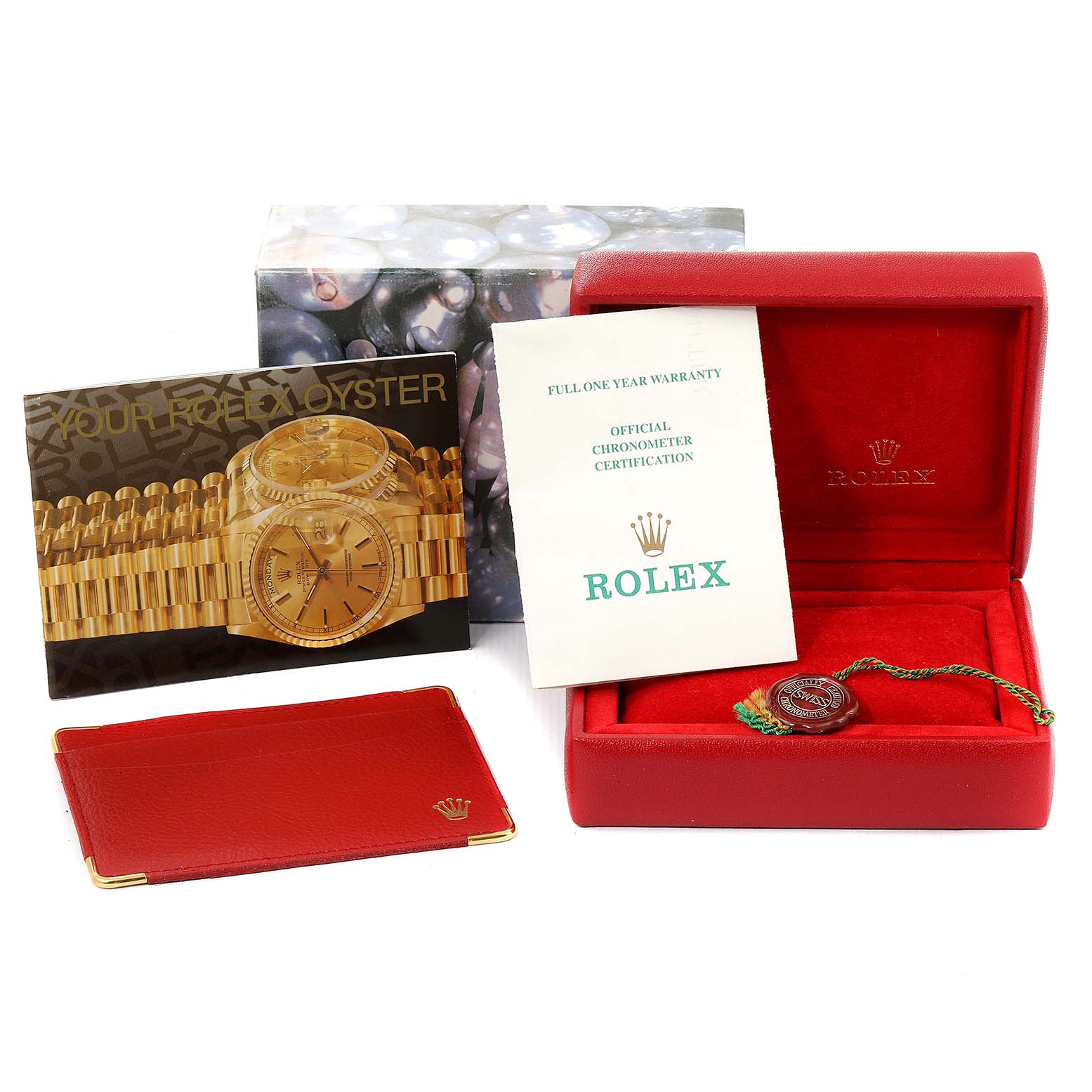 The image shows various accessories for a Rolex Datejust 69174 Women
s Stainless Steel Silver Dial 69174 Women
s Stainless Steel Silver Dial watch, including a box, warranty card, booklet, and certificate.