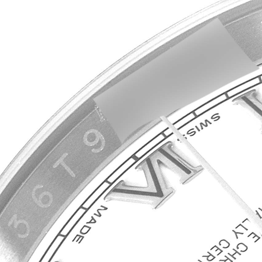 The image shows a close-up of the dial and inner bezel of a Rolex Datejust 116234 Men's Stainless Steel White Dial 116234 Men's Stainless Steel White Dial watch, highlighting Roman numerals and part of the "Swiss" inscription.