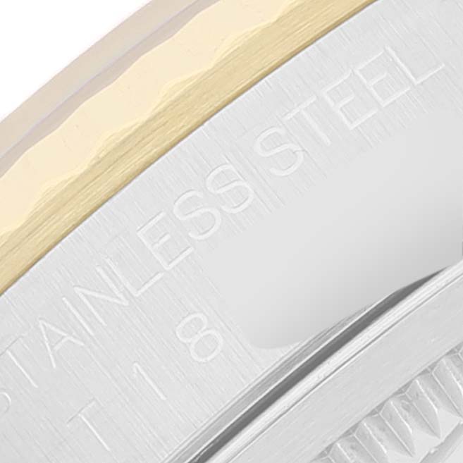 The image shows a close-up of the side of the Rolex Datejust 16233 Men's Steel and Gold (two tone) Black Dial 16233 Men's Steel and Gold (two tone) Black Dial watch, highlighting the stainless steel casing and gold edge.