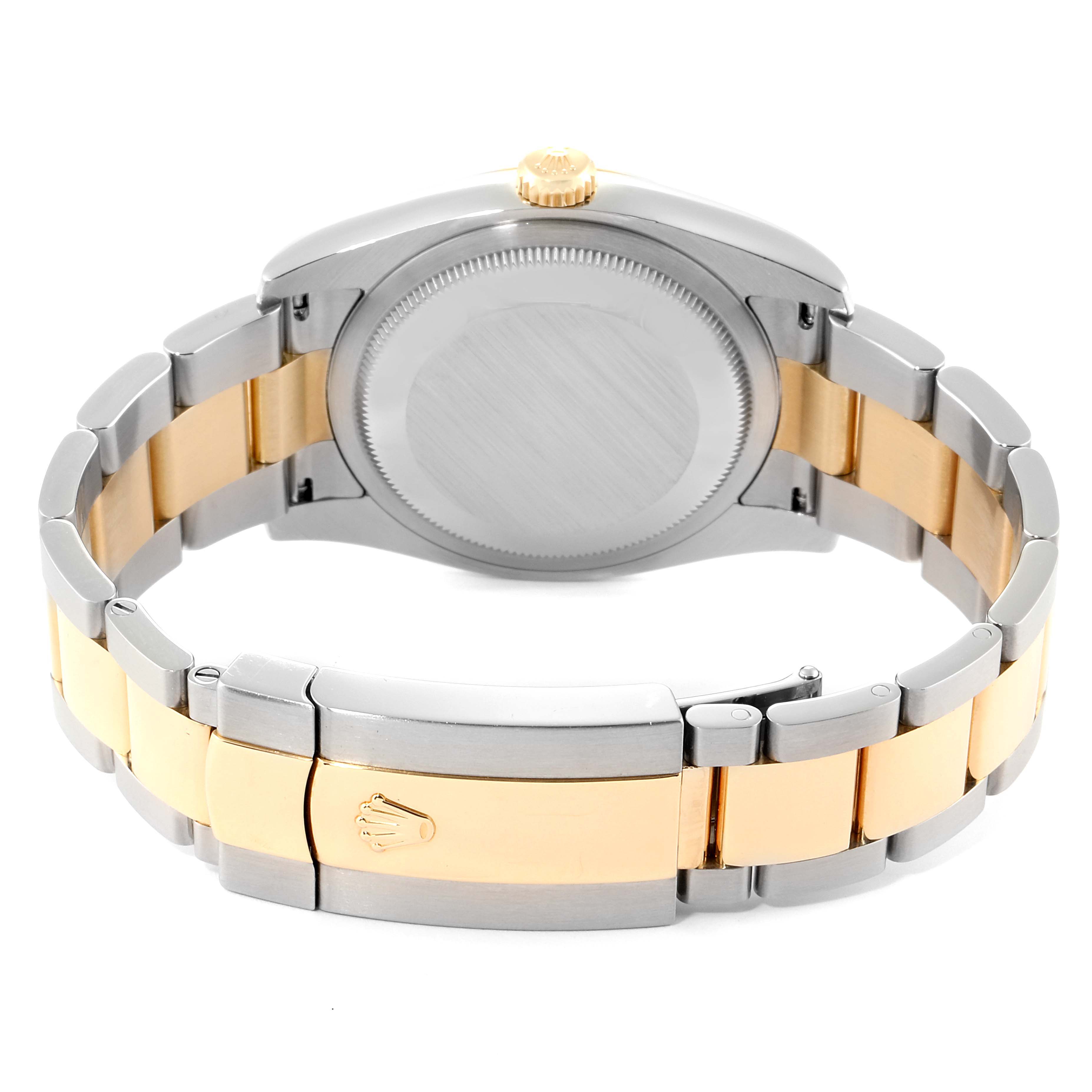 The image shows the back of a Rolex Datejust 116233 Men
s Steel and Gold (two tone) Black Dial 116233 Men
s Steel and Gold (two tone) Black Dial watch, focusing on its two-tone bracelet and clasp with the Rolex logo.