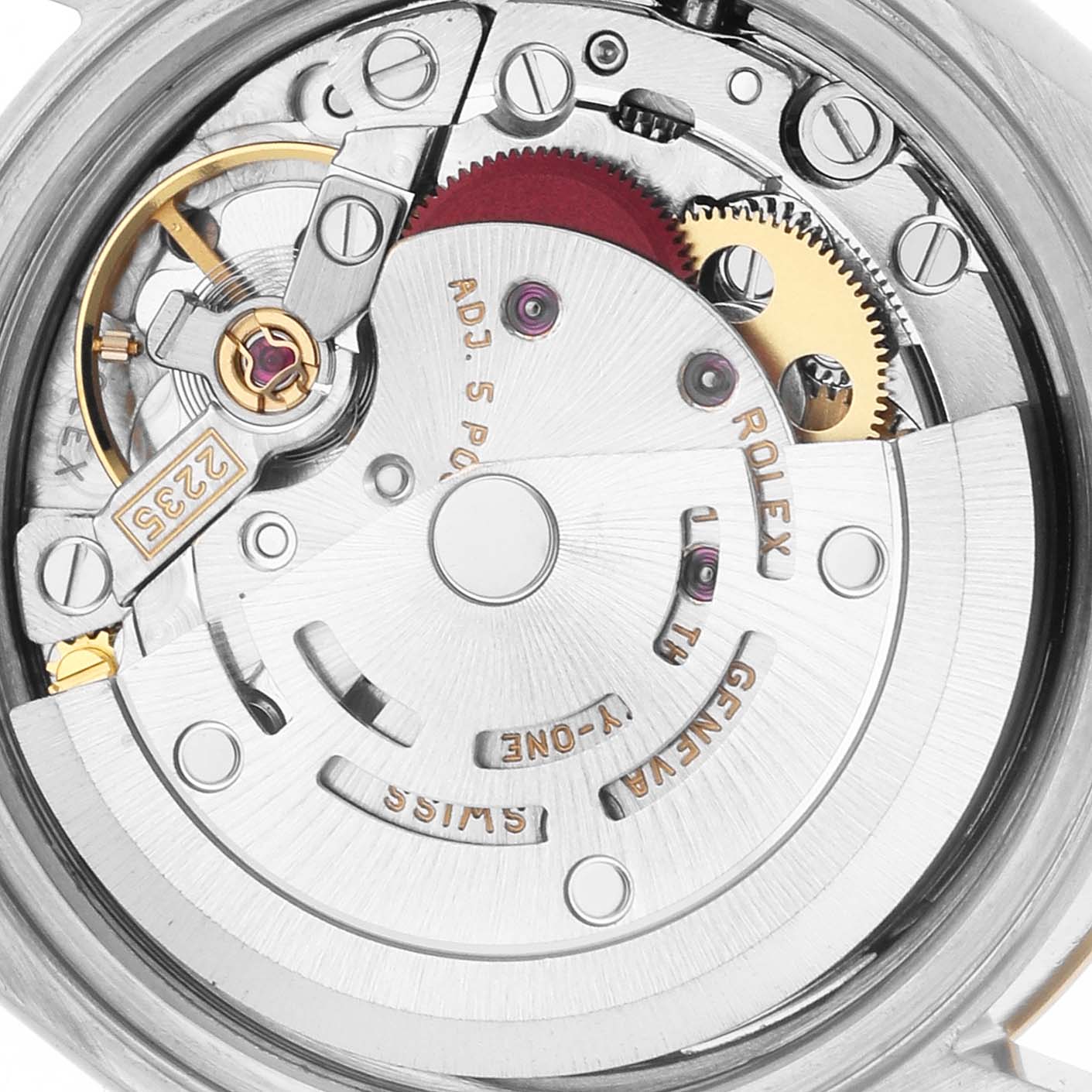The image shows the movement mechanism of a Rolex Datejust 79173 Women
s Steel and Gold (two tone) Champagne Dial watch from the back, highlighting gears and the rotor.