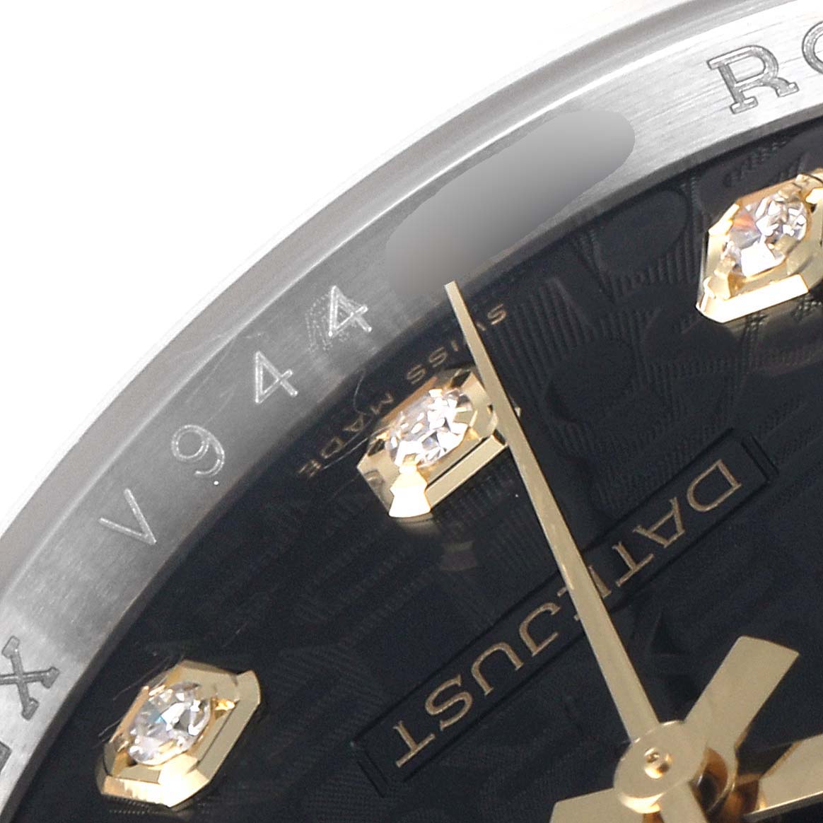 This close-up shows the dial, diamond hour markers, and partial bezel of the Rolex Datejust 116233 Men's Steel and Gold (two tone) Black Dial 116233 Men's Steel and Gold (two tone) Black Dial watch.