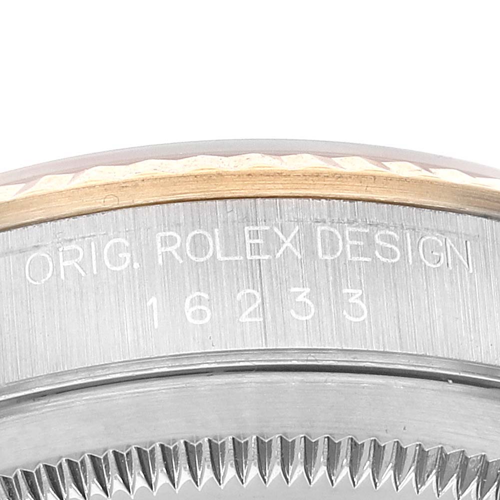 This image shows a close-up of the case side and reference number 16233 on a Rolex Datejust 16233 Men's Steel and Gold (two tone) Champagne Dial 16233 Men's Steel and Gold (two tone) Champagne Dial model watch.