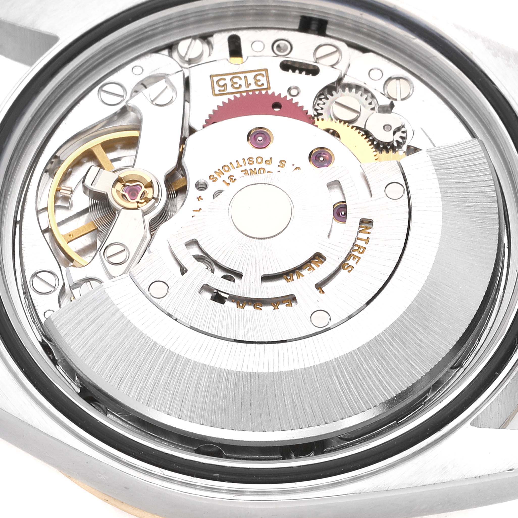 This image shows the intricate internal mechanism of a Rolex Datejust 16233 Men's Steel and Gold (two tone) Champagne Dial 16233 Men's Steel and Gold (two tone) Champagne Dial watch, viewed from the back.