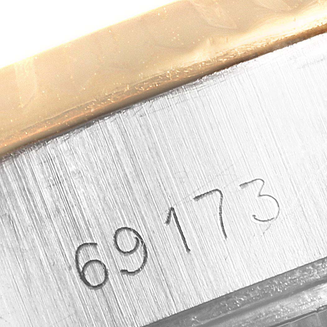 This image shows a close-up of the reference number "69173" engraved on the case of a Rolex Datejust 69173 Women's Steel and Gold (two tone) Champagne Dial 69173 Women's Steel and Gold (two tone) Champagne Dial watch.