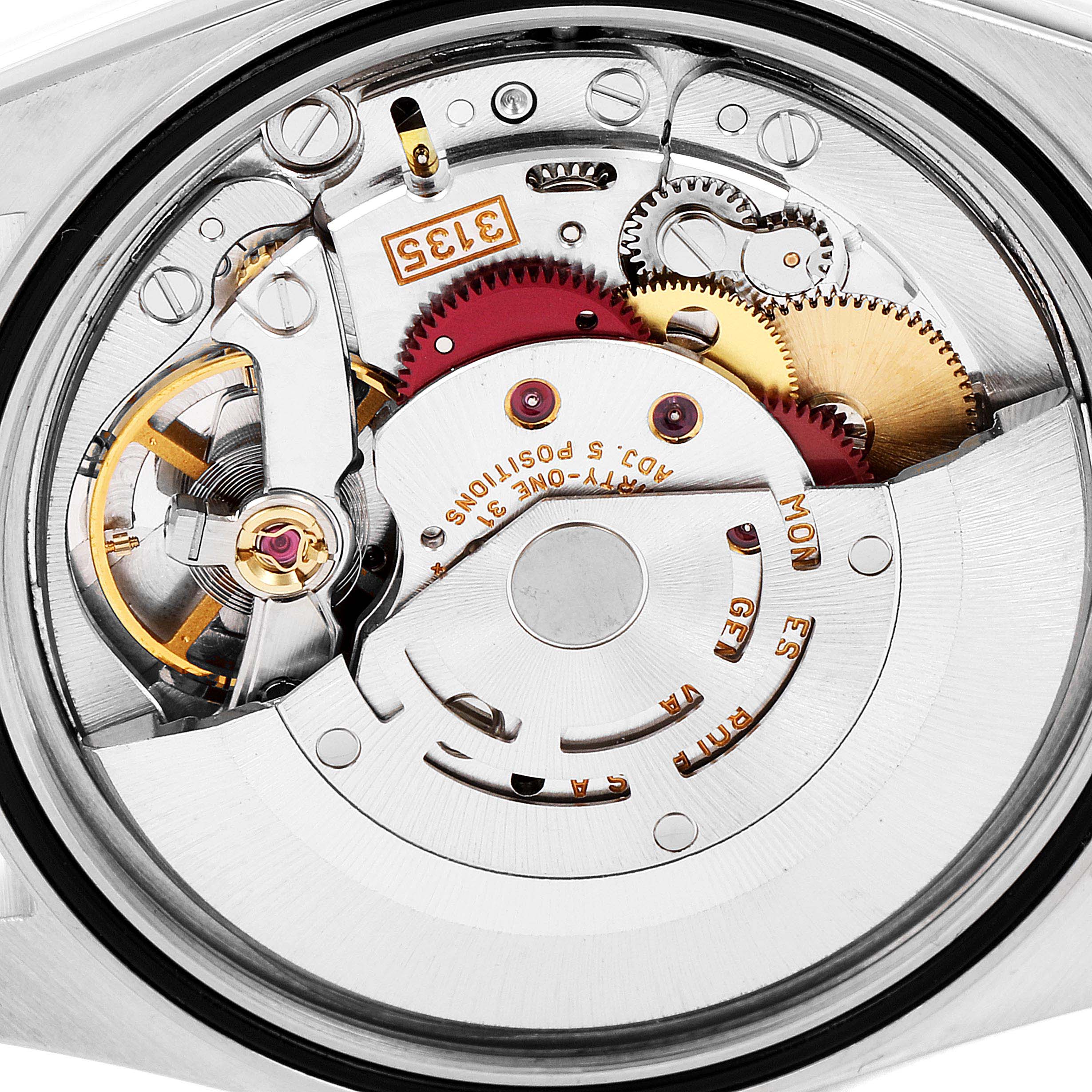 This image shows an internal view of the movement mechanism of the Rolex Datejust 16233 Men's Steel and Gold (two tone) White Dial 16233 Men's Steel and Gold (two tone) White Dial watch model, highlighting gears and components.