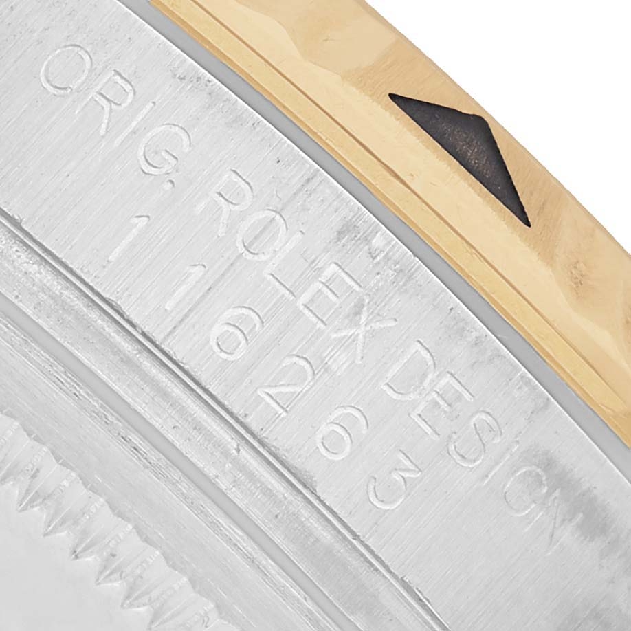 The image shows a close-up of the model number engraving on the side of a Rolex Datejust 116263 Men's Stainless Steel White Dial case.
