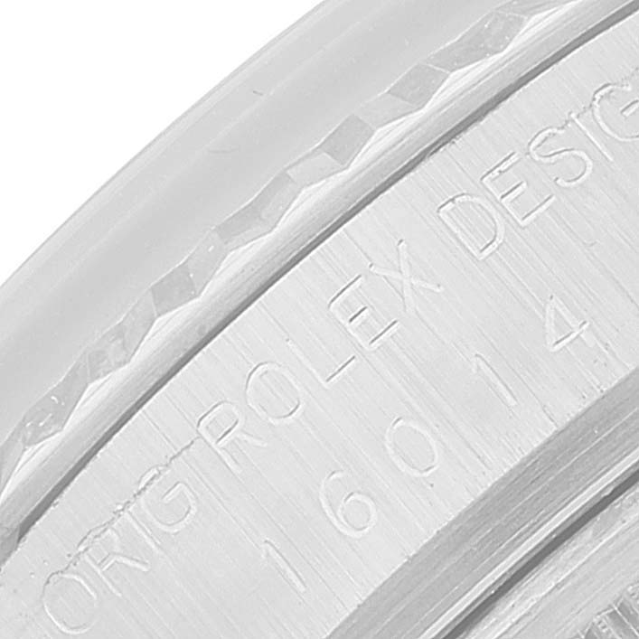 This image shows a close-up view of the engraved caseback of a Vintage Collection Rolex watch, highlighting the model number "16014".
