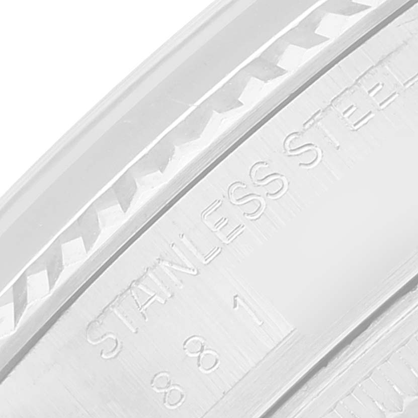 This close-up image shows the side engraving on a stainless steel Vintage Collection Rolex watch.