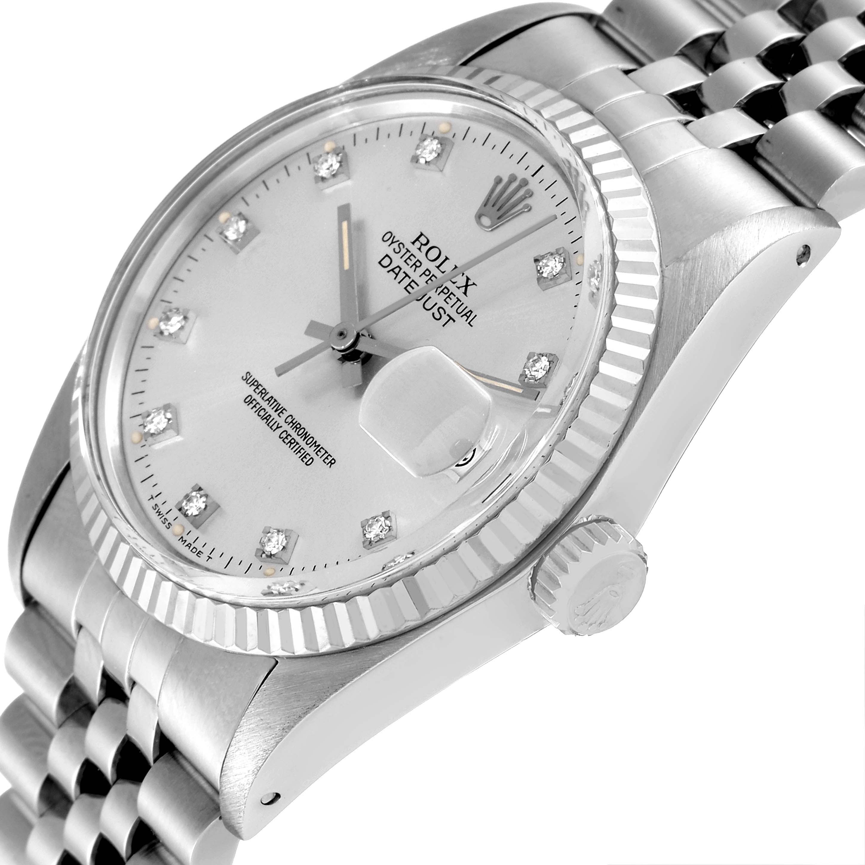 The image shows a close-up angle of a Rolex Vintage Collection 16014 Men
s Stainless Steel Silver Dial 16014 Men
s Stainless Steel Silver Dial Oyster Perpetual Datejust watch, highlighting the dial, crown, and Jubilee bracelet.