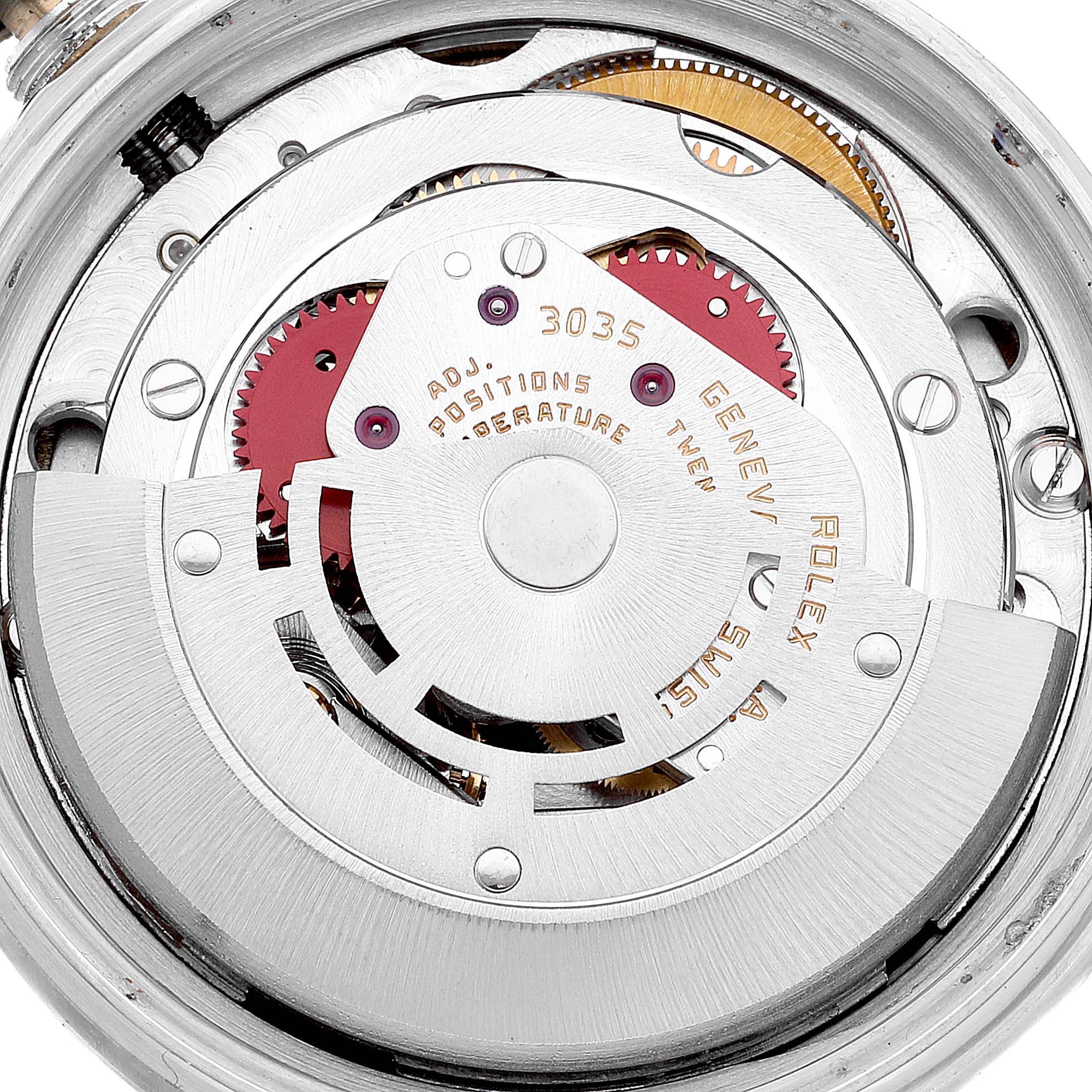 The image shows the internal mechanism of a Rolex Vintage Collection 16014 Men
s Stainless Steel Silver Dial 16014 Men
s Stainless Steel Silver Dial model from a top angle, highlighting the rotor and gears.