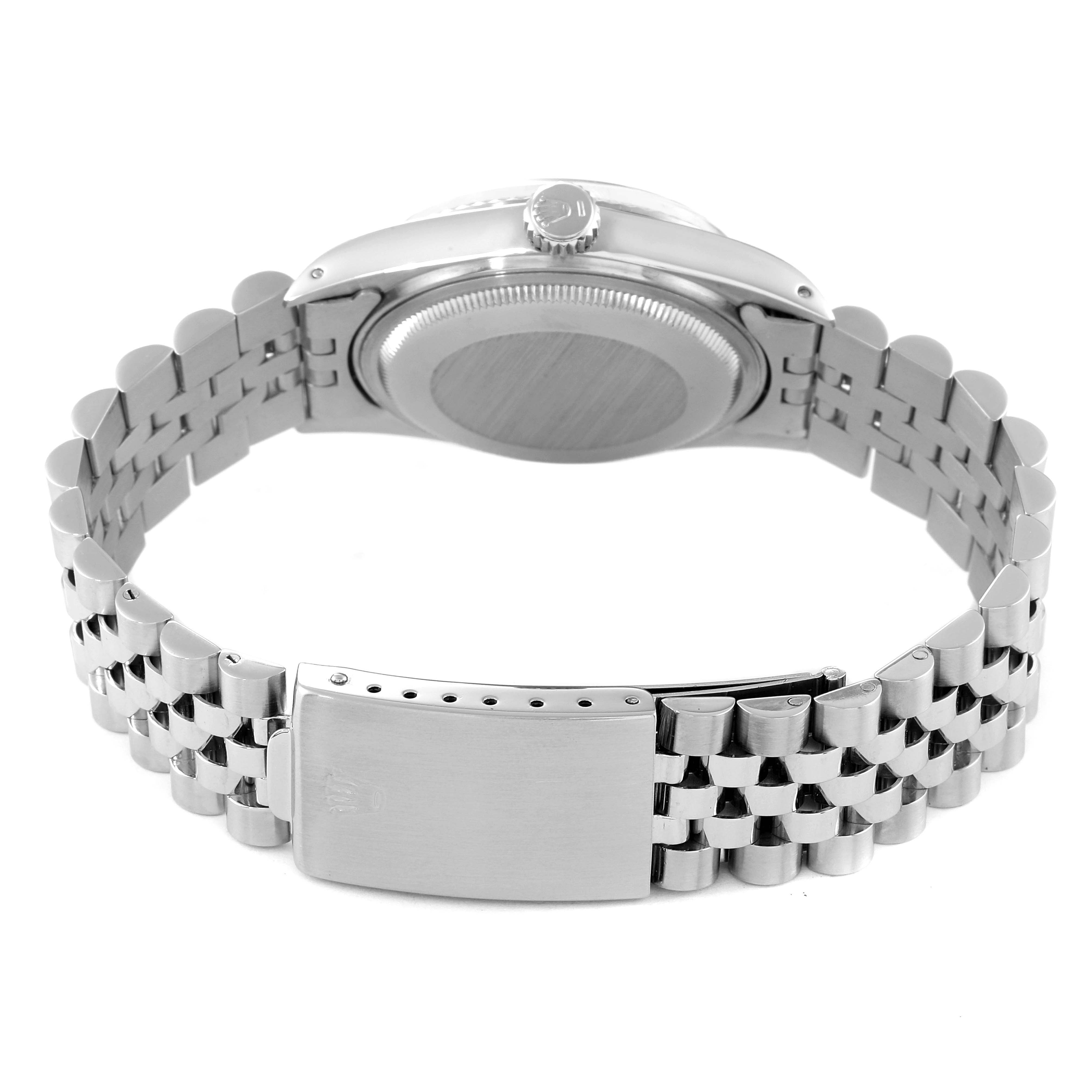 The image shows the back and clasp of a Rolex Vintage Collection 16014 Men
s Stainless Steel Silver Dial 16014 Men
s Stainless Steel Silver Dial model watch.