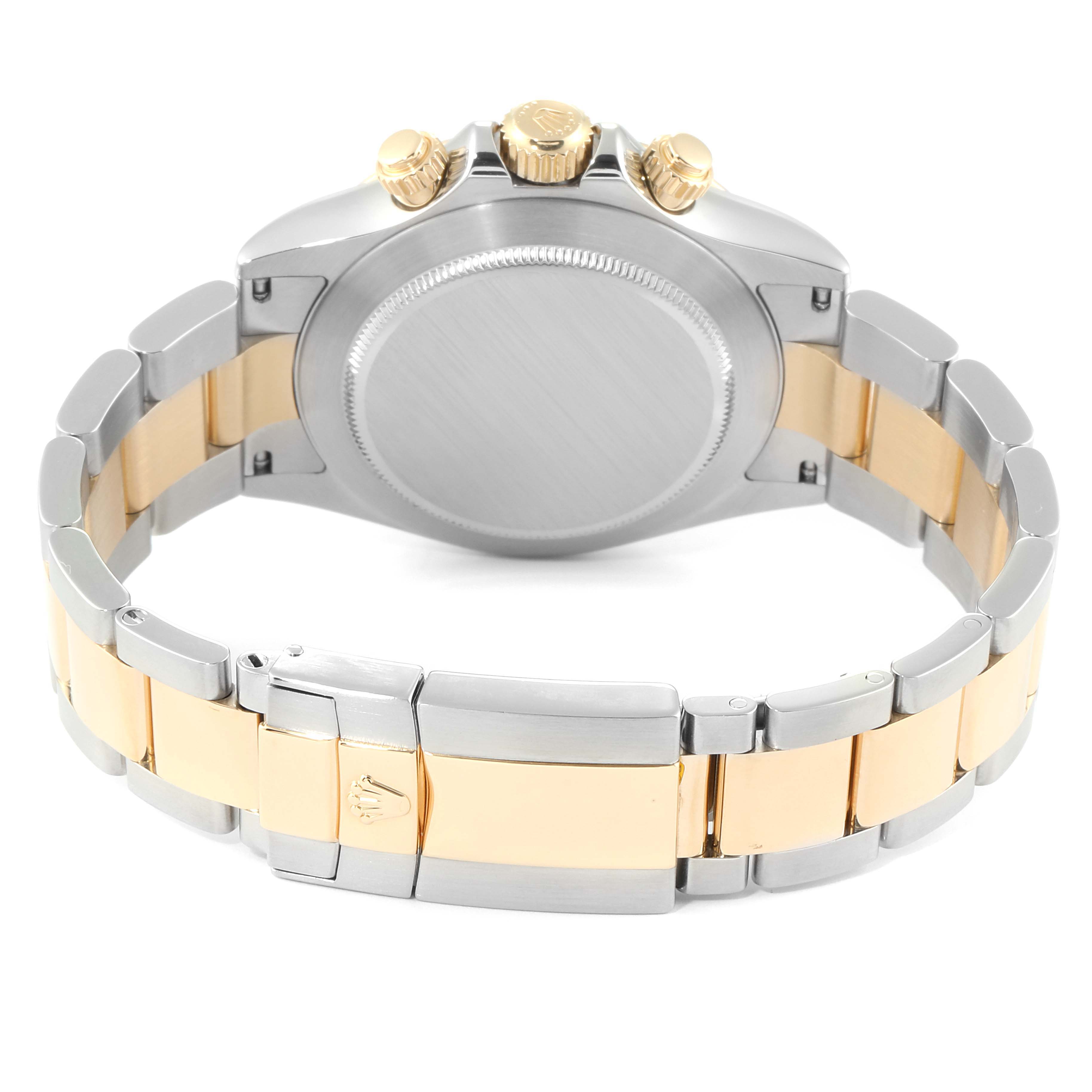 The image shows the back view of a Rolex Daytona 116523 Men
s Steel and Gold (two tone) Black Dial 116523 Men
s Steel and Gold (two tone) Black Dial watch, highlighting its case back, crown, and two-tone bracelet.