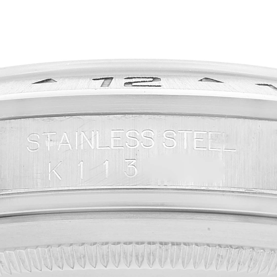 This image shows a close-up of the side engraving on a stainless steel Rolex Explorer 16570 Men's Stainless Steel Black Dial 16570 Men's Stainless Steel Black Dial watch case.