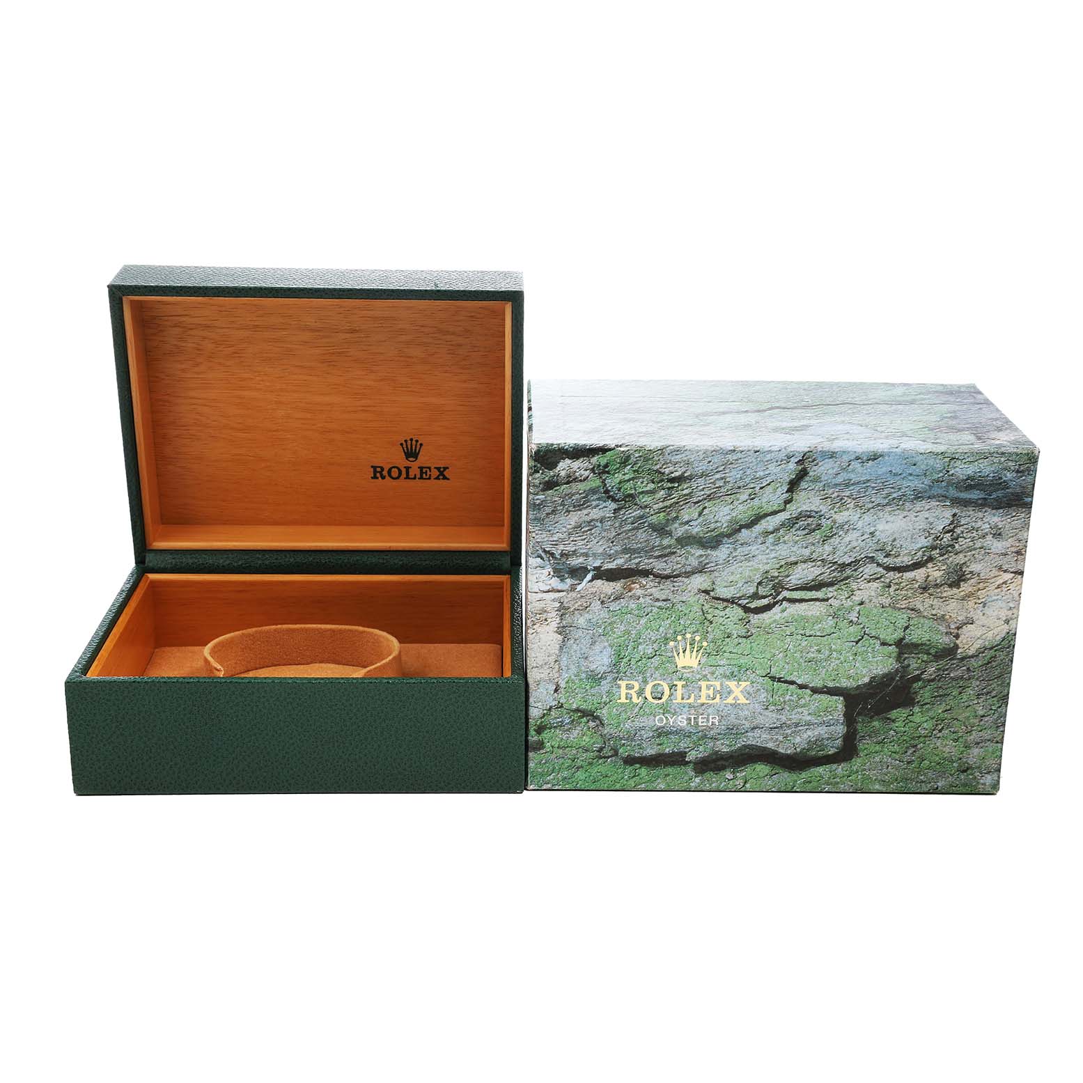 The image shows a Rolex Explorer 16570 Men's Stainless Steel Black Dial watch box open at an angle with wood interior and an outer sleeve featuring a rock texture.