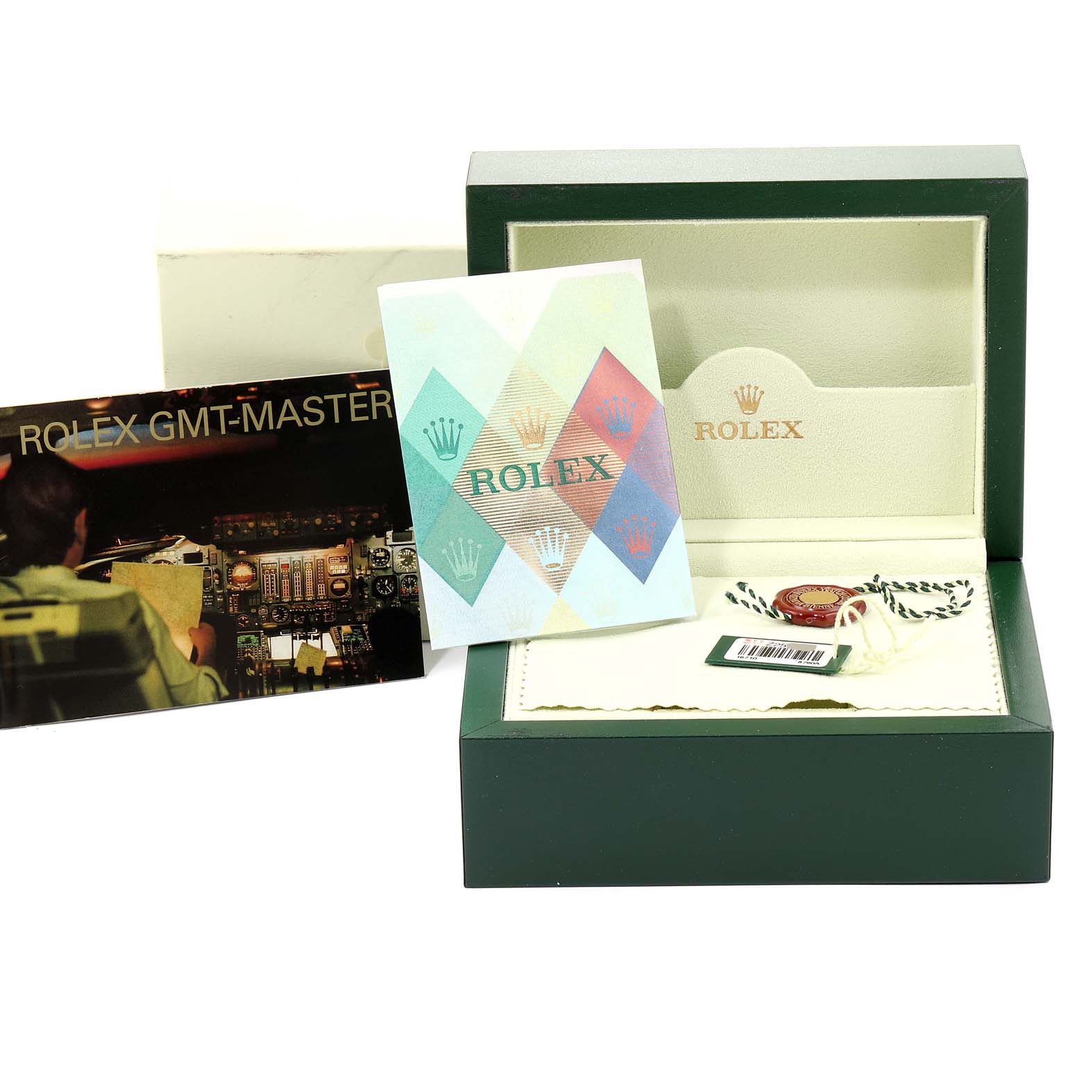The image shows the box, manuals, and accessories of a Rolex GMT-Master 16710 Men's Stainless Steel Black Dial 16710 Men's Stainless Steel Black Dial watch.