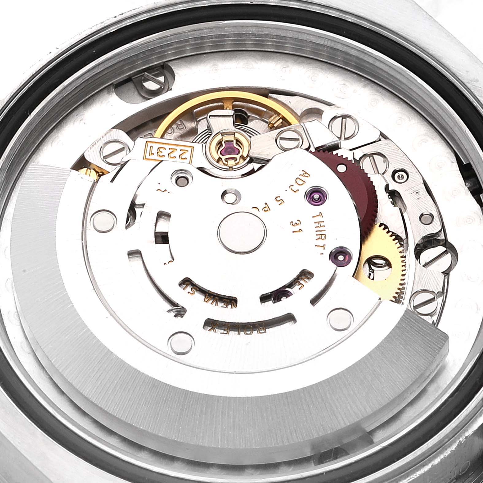 This image shows a close-up of the inner mechanical movement parts of a Rolex Mid-Size 177200 Women
s Stainless Steel Black Dial 177200 Women
s Stainless Steel Black Dial watch.