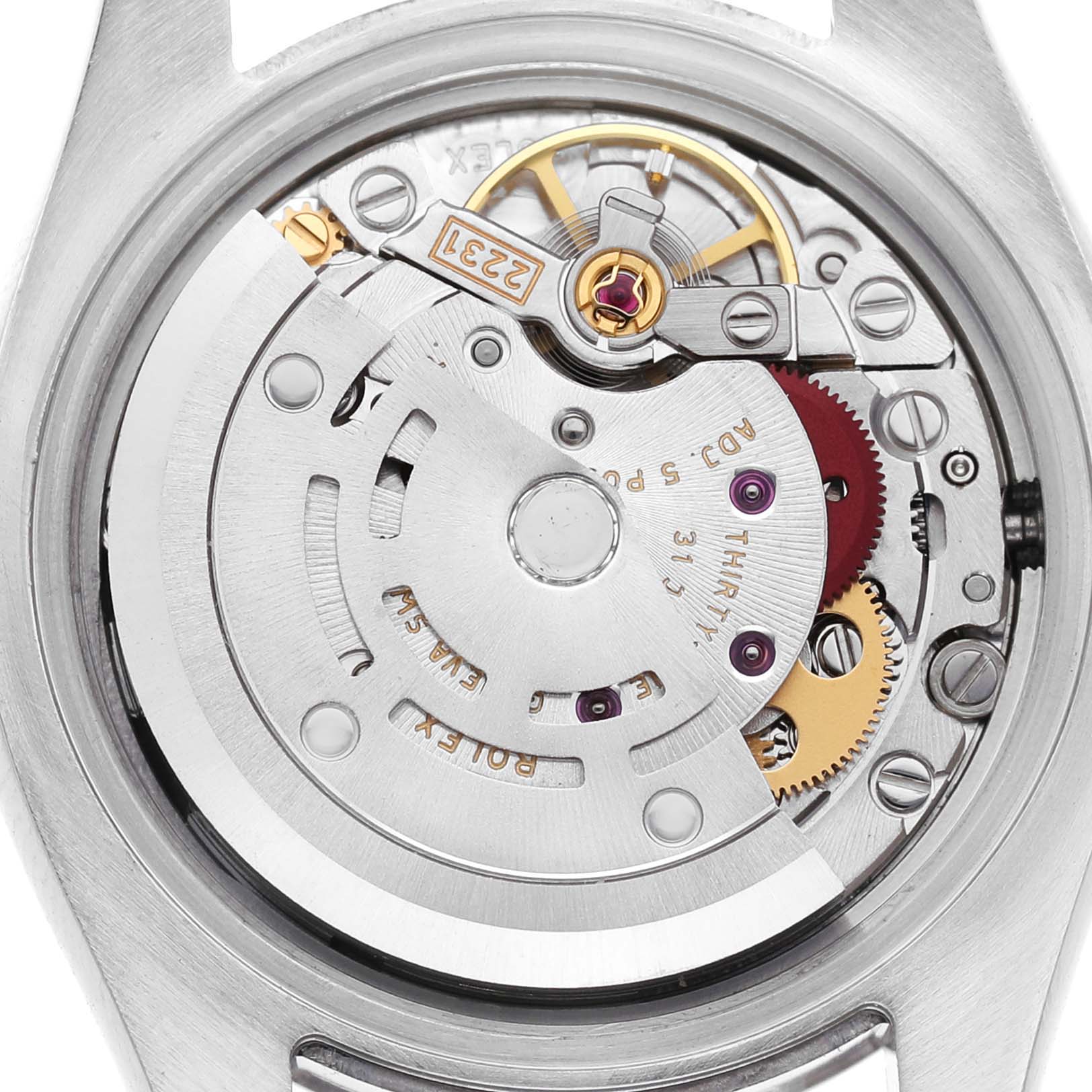 The image shows the movement mechanism of a Rolex Oyster Perpetual 176200 Women's Stainless Steel Black Dial watch from the back angle.