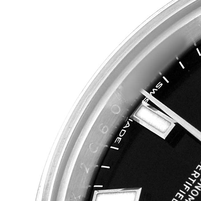 The image shows a partial close-up of the dial and hands of a Rolex Oyster Perpetual 176200 Women's Stainless Steel Black Dial watch, focusing on the edge and markers.