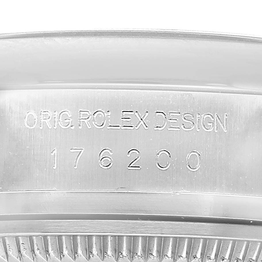 The image shows an engraved side view of the Rolex Oyster Perpetual 176200 Men's Stainless Steel Black Dial watch case with "ORIG. ROLEX DESIGN" and a model number.
