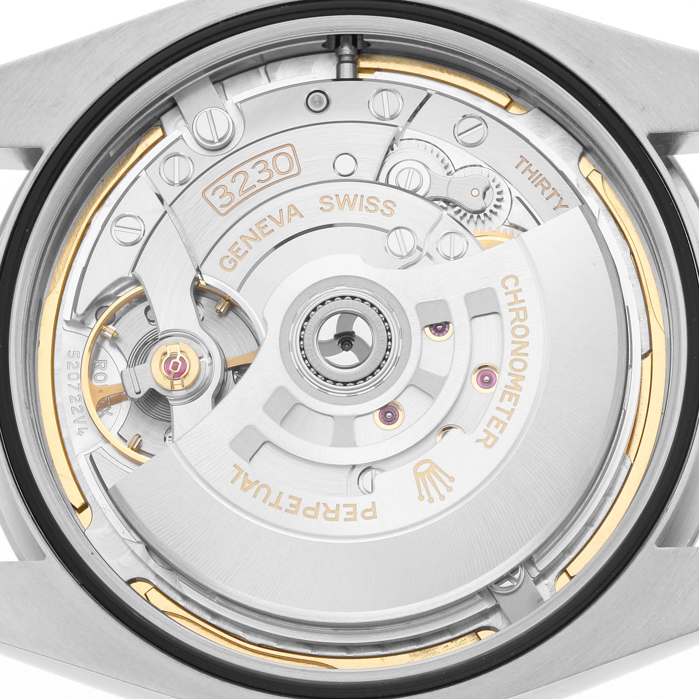 The image shows the back view of a Rolex Oyster Perpetual 124300 Men
s Stainless Steel Blue Dial, highlighting the 3230 movement and rotor mechanism.