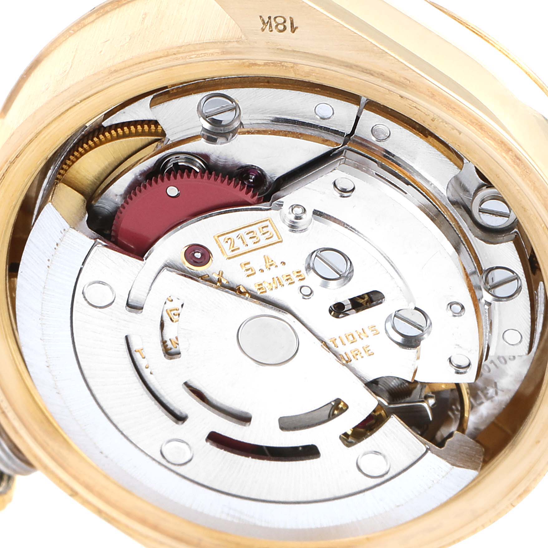 This image shows the intricate internal mechanics of a Rolex President 69178 Women
s Yellow Gold Champagne Dial 69178 Women
s Yellow Gold Champagne Dial model watch, focusing on its movement and gears.