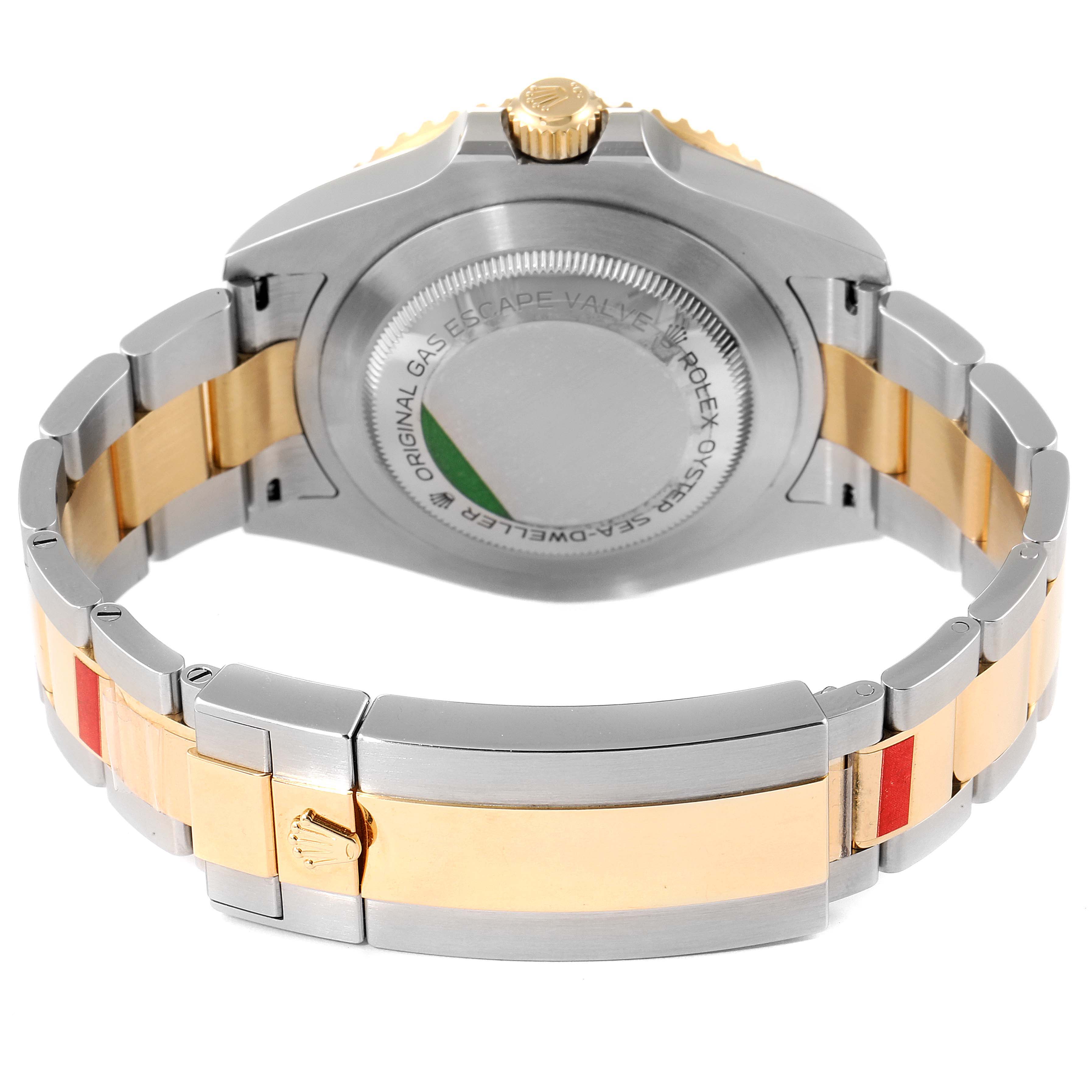 The image shows the back and bracelet of the Rolex Sea-Dweller 126603 Men's Steel and Gold (two tone) Black Dial 126603 Men's Steel and Gold (two tone) Black Dial watch, highlighting its stainless steel and gold elements.