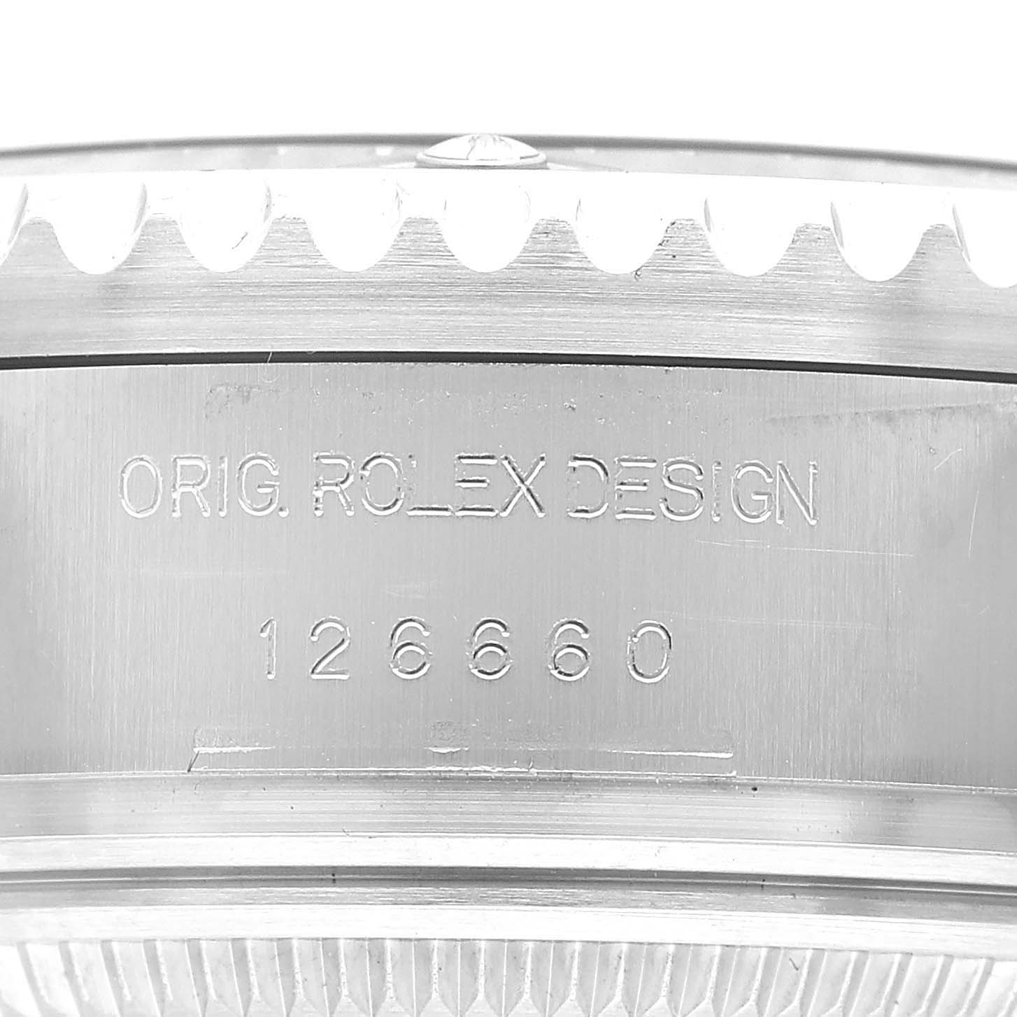 The image shows the side view of the Rolex Sea-Dweller 126660 Men's Stainless Steel Blue Dial, featuring the engraved model number "126660" and "Orig Rolex Design" on its case.