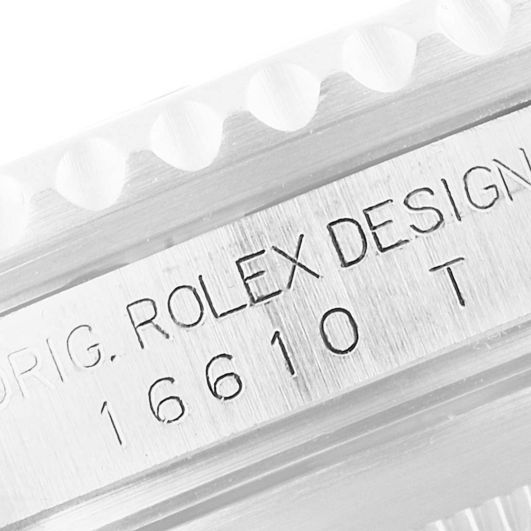 This close-up image shows the model engraving on the side of the bezel and the case of a Rolex Submariner 16610 Men
s Stainless Steel Black Dial 16610 Men
s Stainless Steel Black Dial.