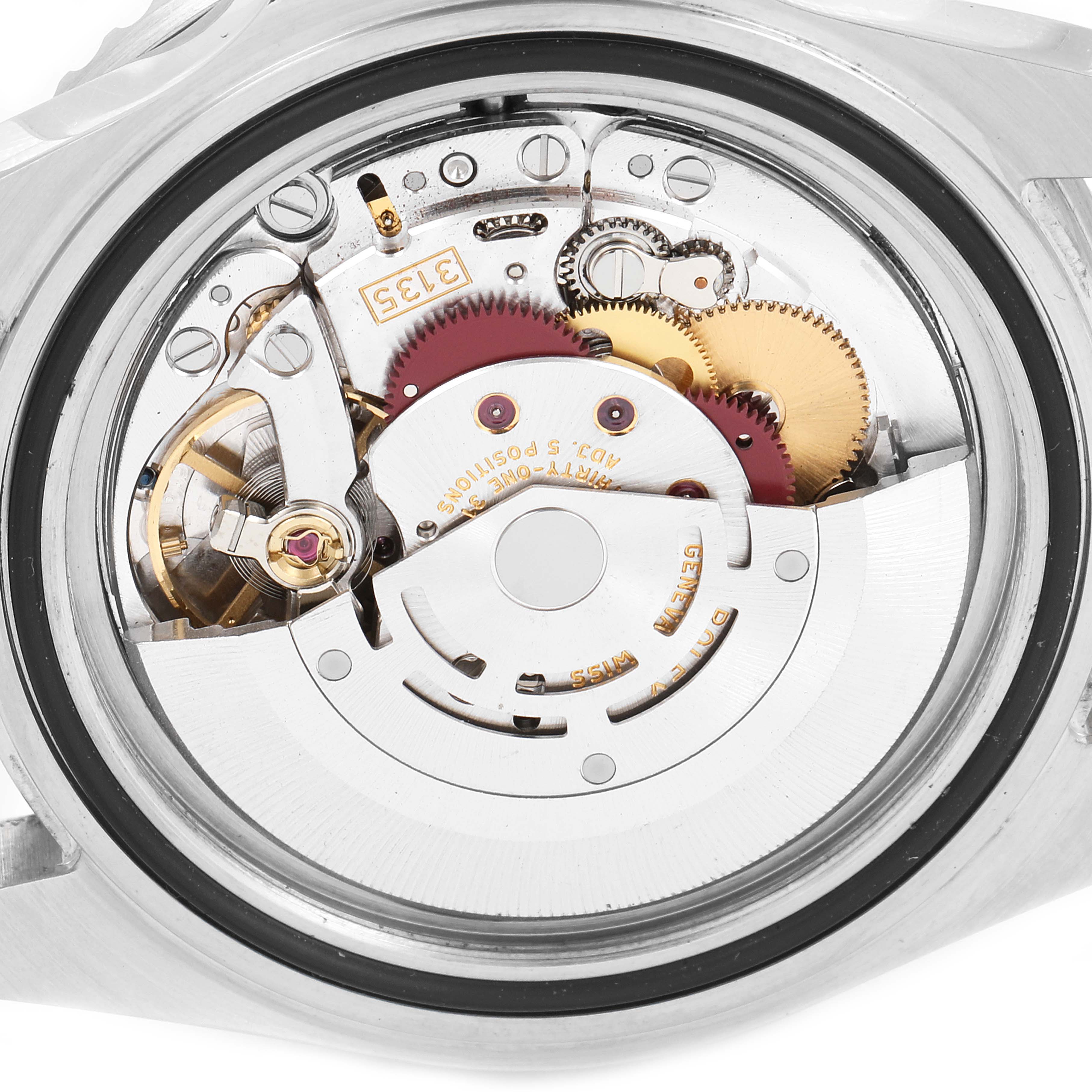 The image shows the back of the Rolex Submariner 16610 Men
s Stainless Steel Black Dial 16610 Men
s Stainless Steel Black Dial, revealing its intricate mechanical movement and internal components.