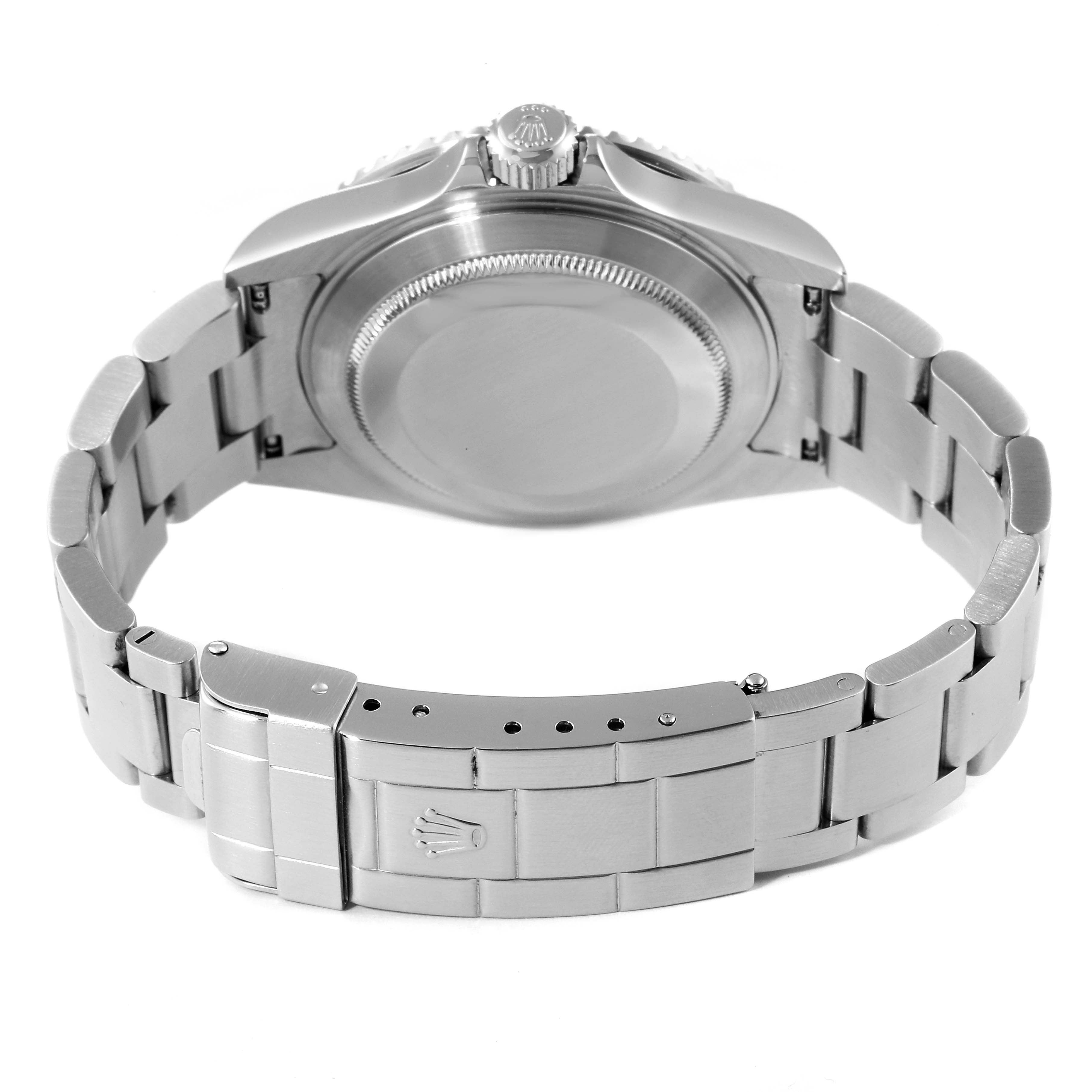 This image shows the back side of the Rolex Submariner 16610 Men
s Stainless Steel Black Dial 16610 Men
s Stainless Steel Black Dial watch, including the case back, crown, and bracelet with a clasp.