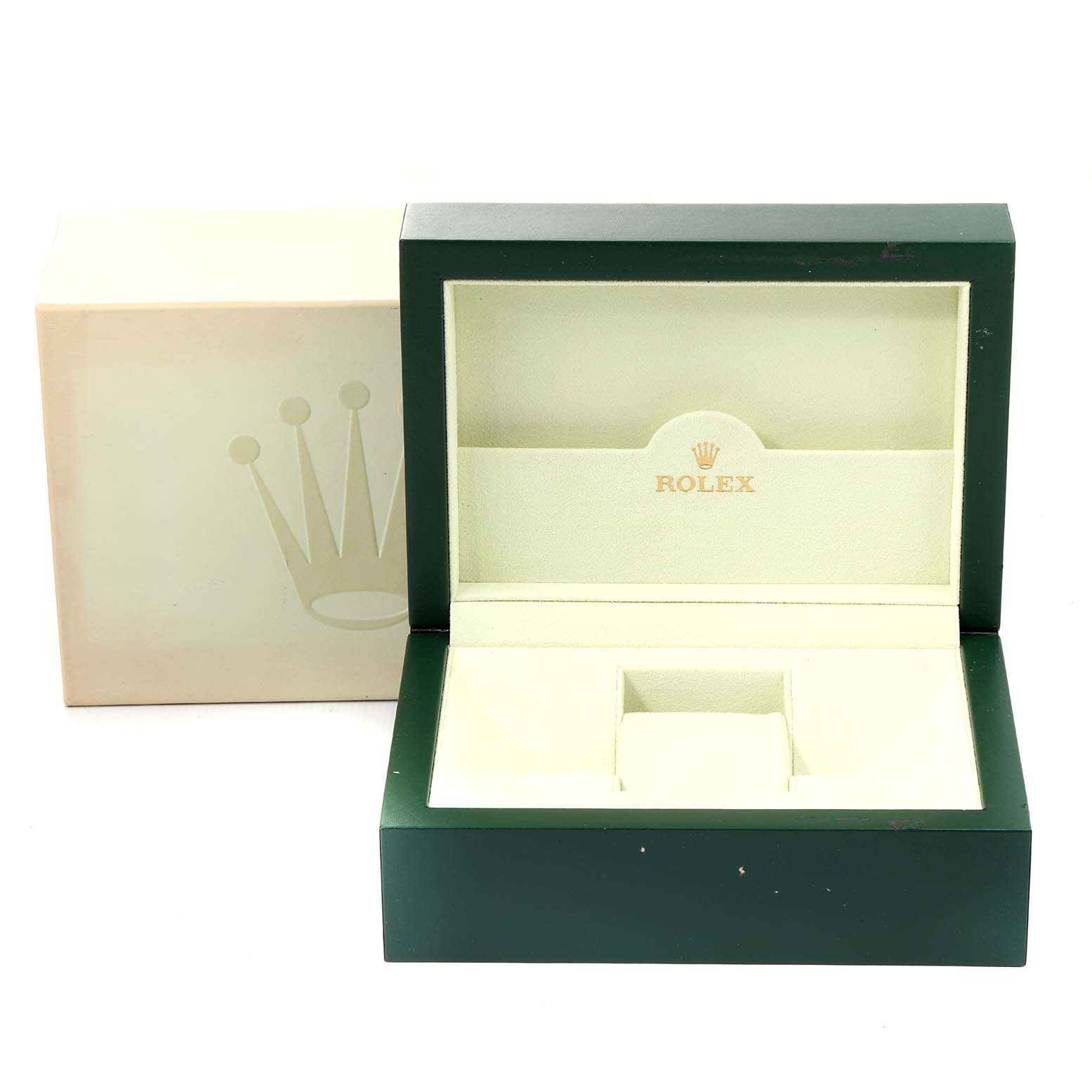 The image shows an open Rolex Submariner 16610 Men
s Stainless Steel Black Dial 16610 Men
s Stainless Steel Black Dial watch box with its outer packaging visible in the background.