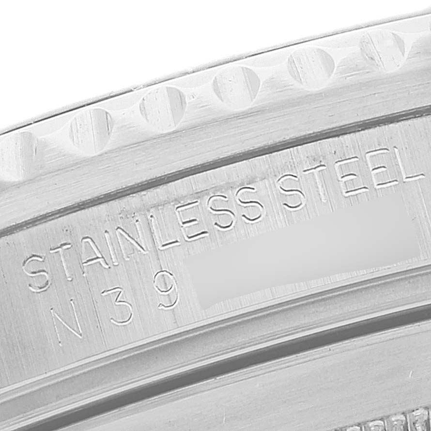 This image shows a close-up of the engraved edge of a Rolex Submariner 16610 Men
s Stainless Steel Black Dial 16610 Men
s Stainless Steel Black Dial watch, highlighting the "STAINLESS STEEL" marking.