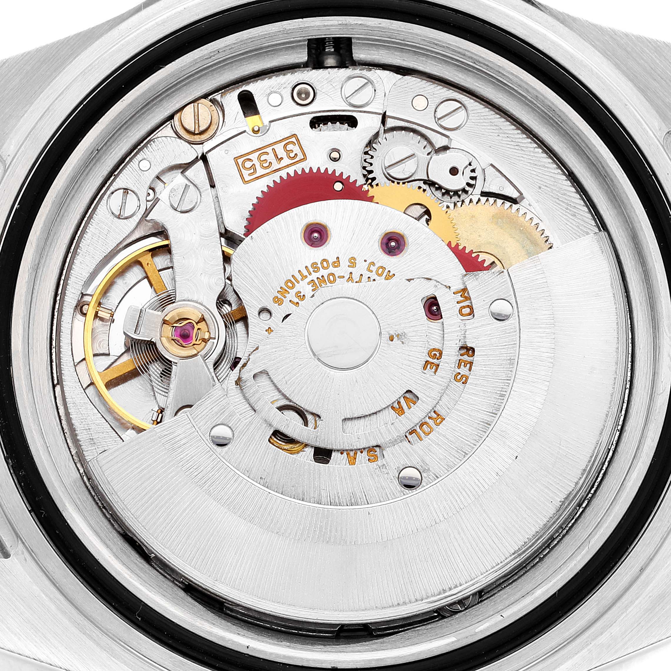 This image shows an up-close view of the Rolex Submariner 16610 Men
s Stainless Steel Black Dial 16610 Men
s Stainless Steel Black Dial
s intricate mechanical movement from the back of the watch.